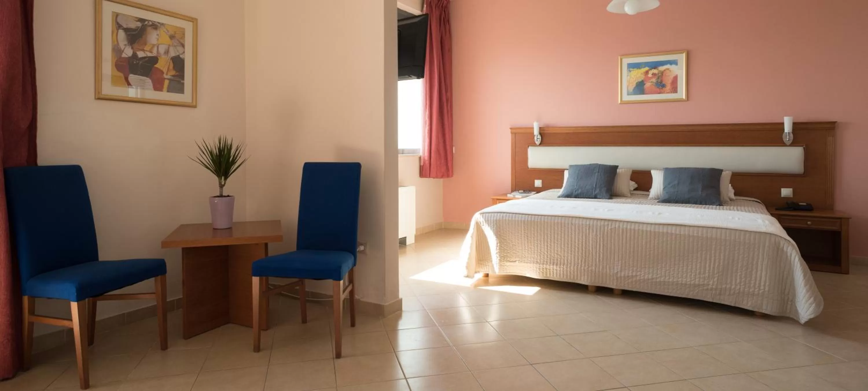 Bed in Acharnis Kavallari Hotel Suites