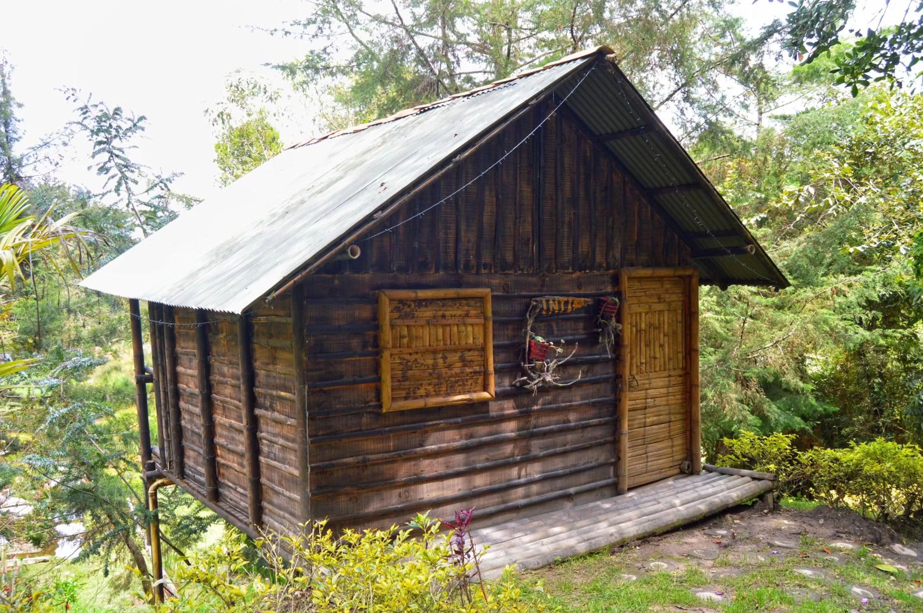 Property Building in Cabañas Rústicas El Viejo Tambo By Rotamundos