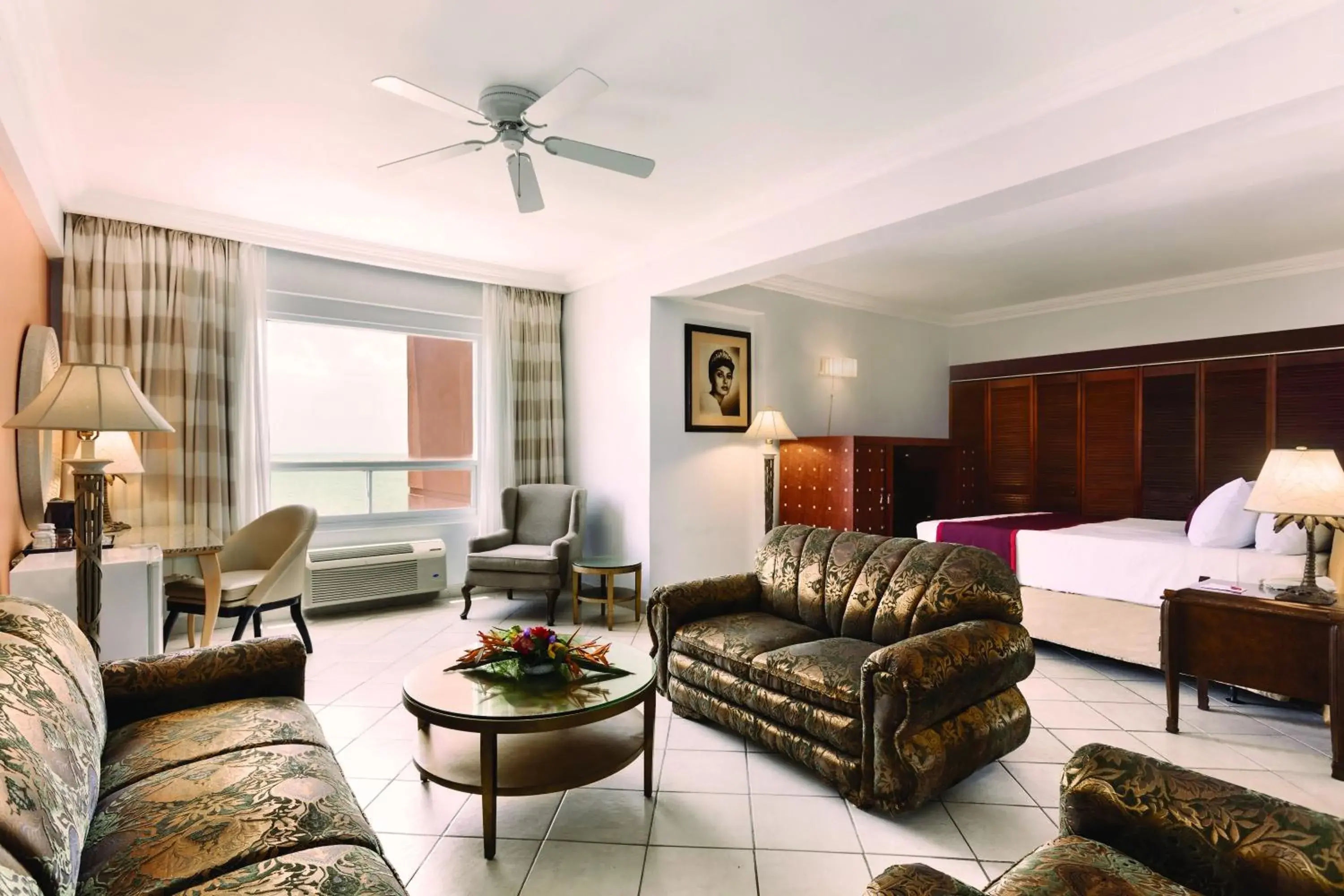 Photo of the whole room, Seating Area in Ramada by Wyndham Princess Belize City