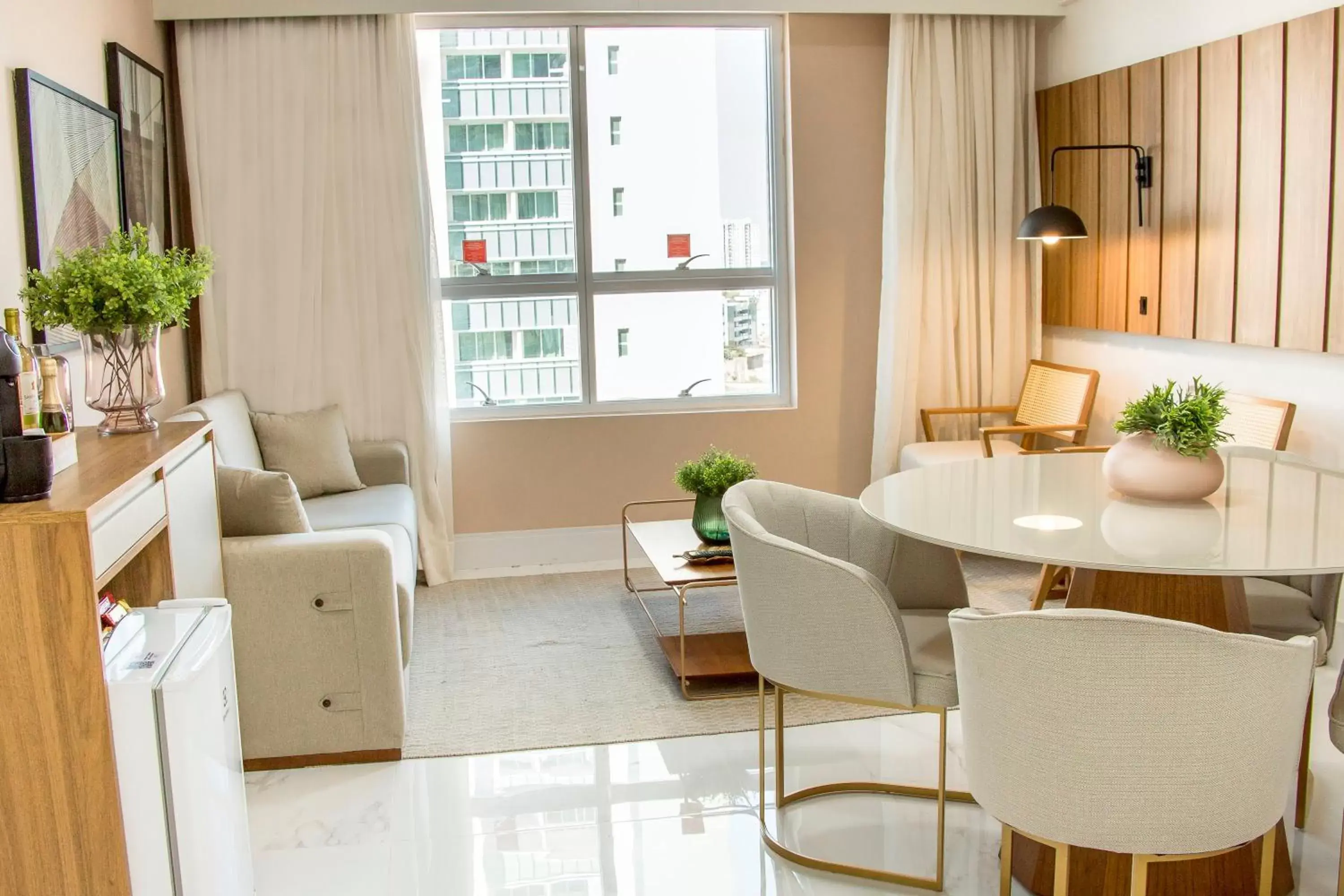 Living room, Seating Area in Ramada Hotel & Suites Campos Pelinca