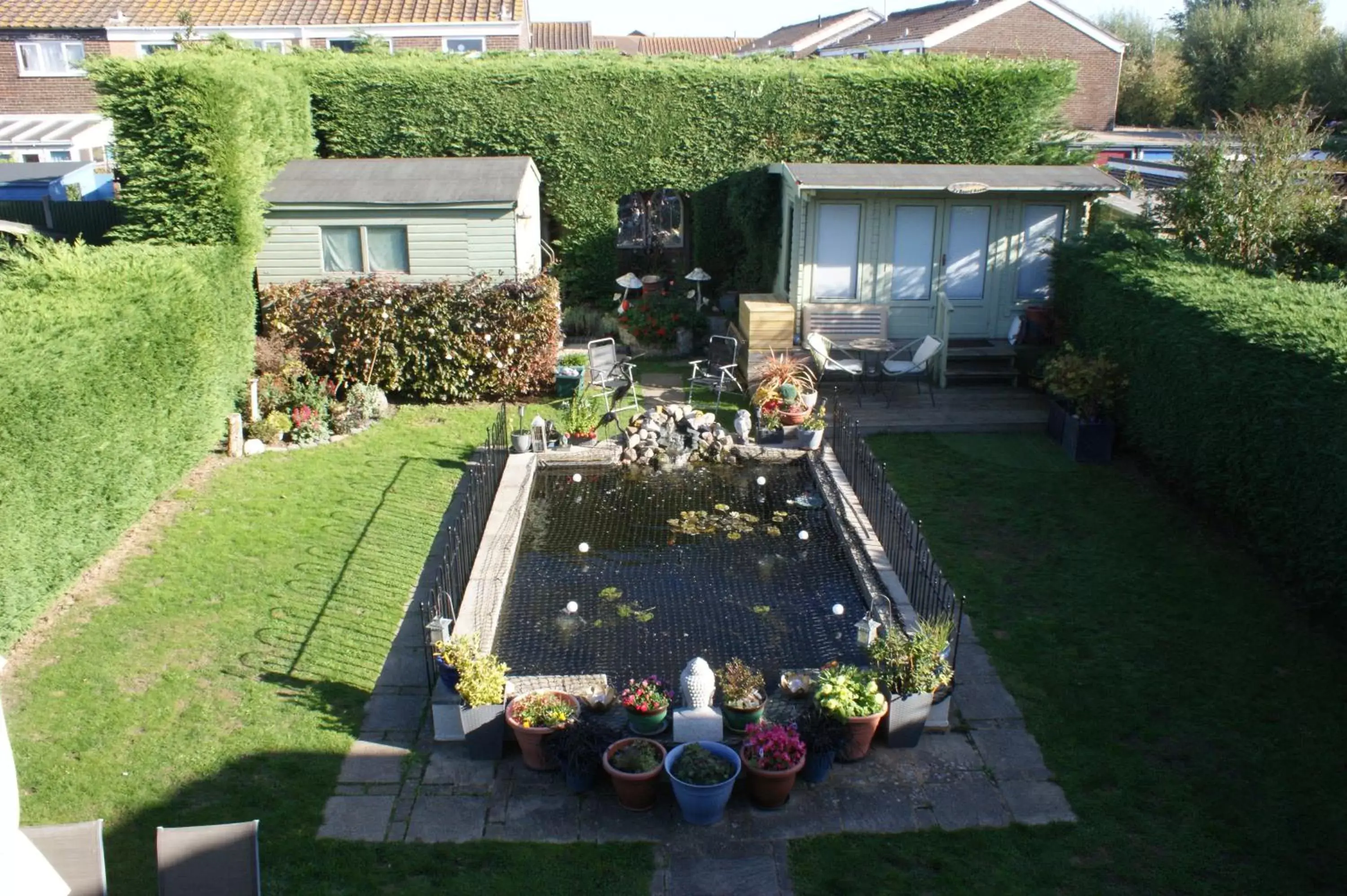 Garden view, Pool View in Leeward House B&B