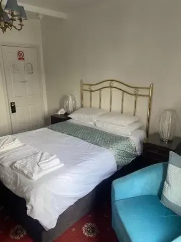 Bed in Parlors Hall Hotel