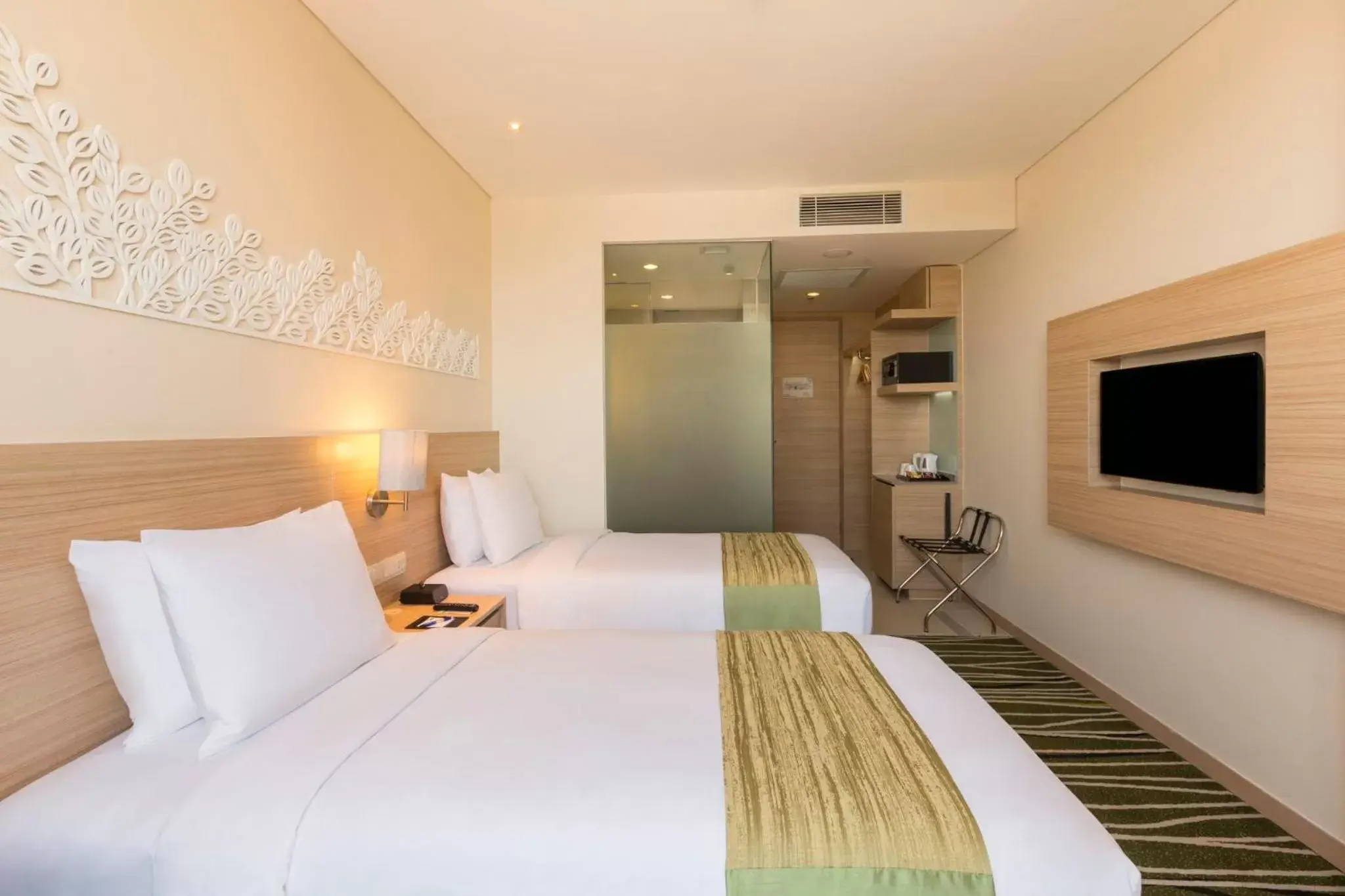 Photo of the whole room, Bed in Holiday Inn Express Semarang Simpang Lima, an IHG Hotel