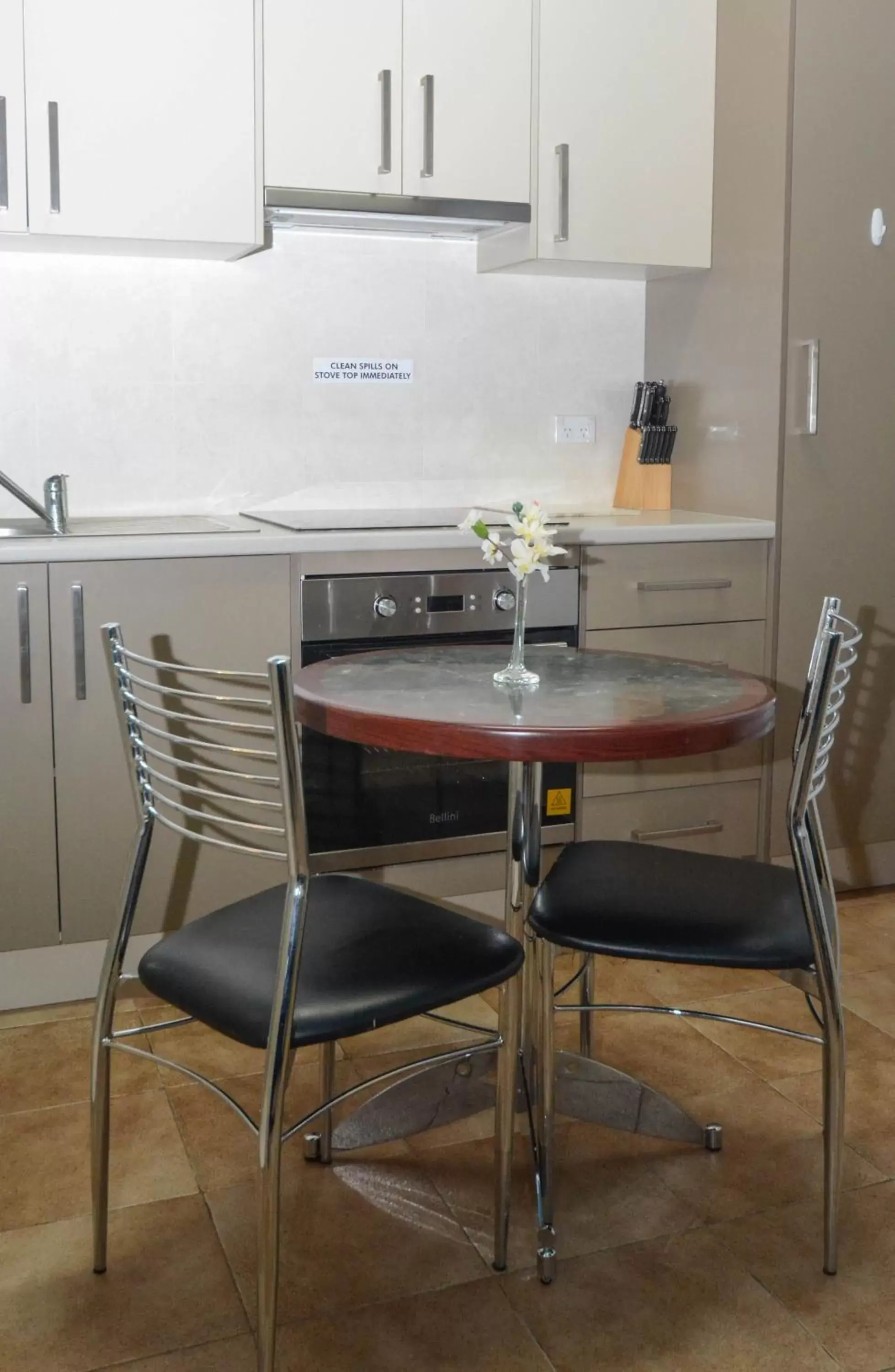 Dining area, Kitchen/Kitchenette in Westside Studio Apartments