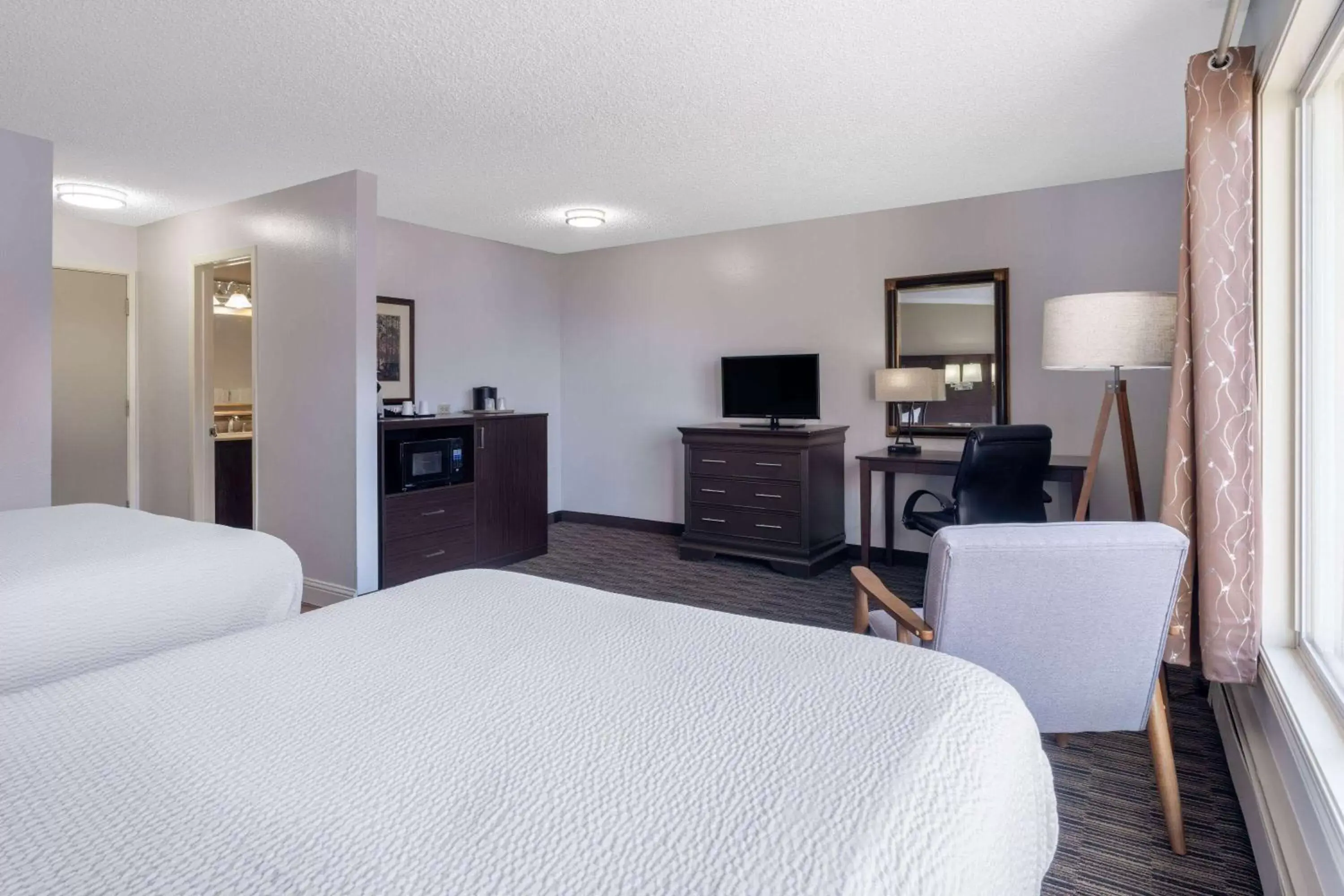 Photo of the whole room, TV/Entertainment Center in Ramada by Wyndham Juneau