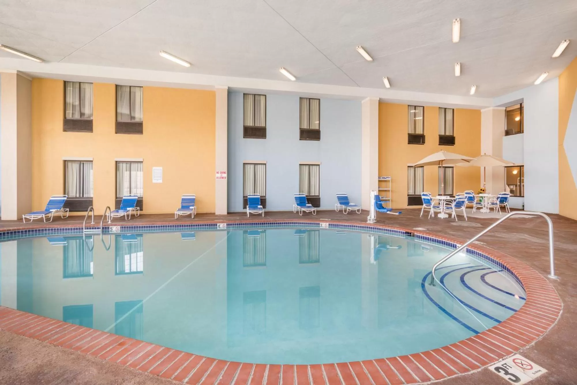Swimming pool in AmericInn by Wyndham Johnston Des Moines