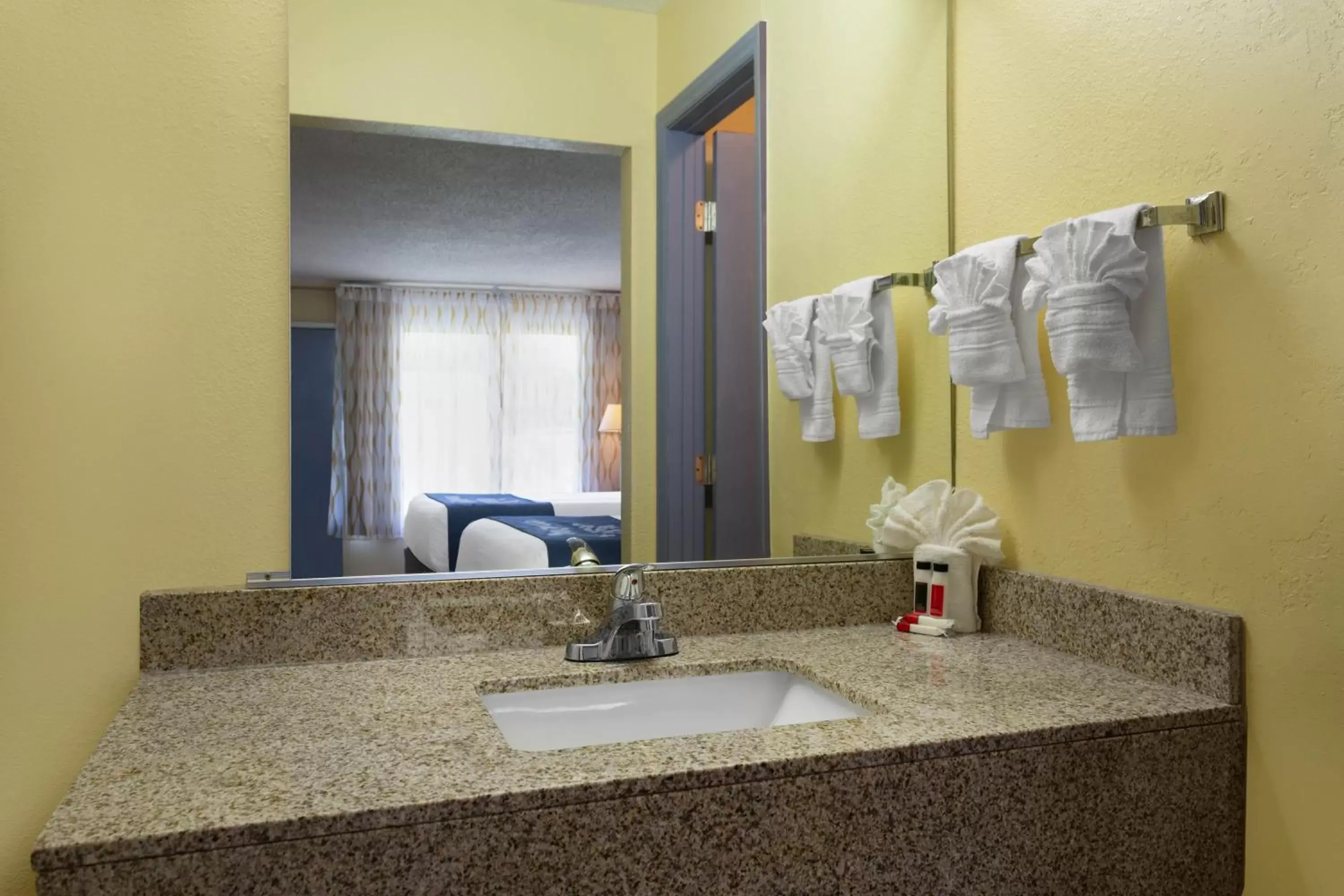 Bathroom in Days Inn by Wyndham Greensboro Airport