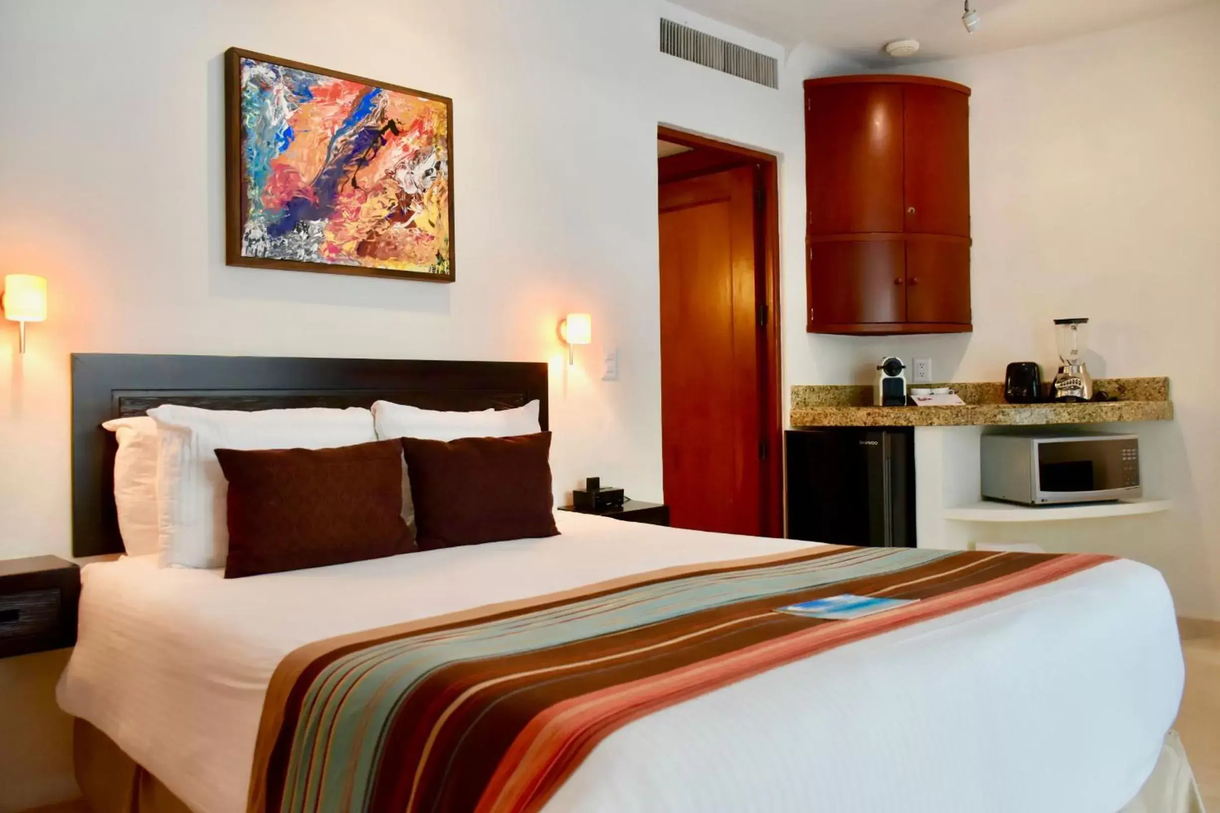 Bed in Playa Palms Beach Hotel Bed in Playa Palms Beach Hotel