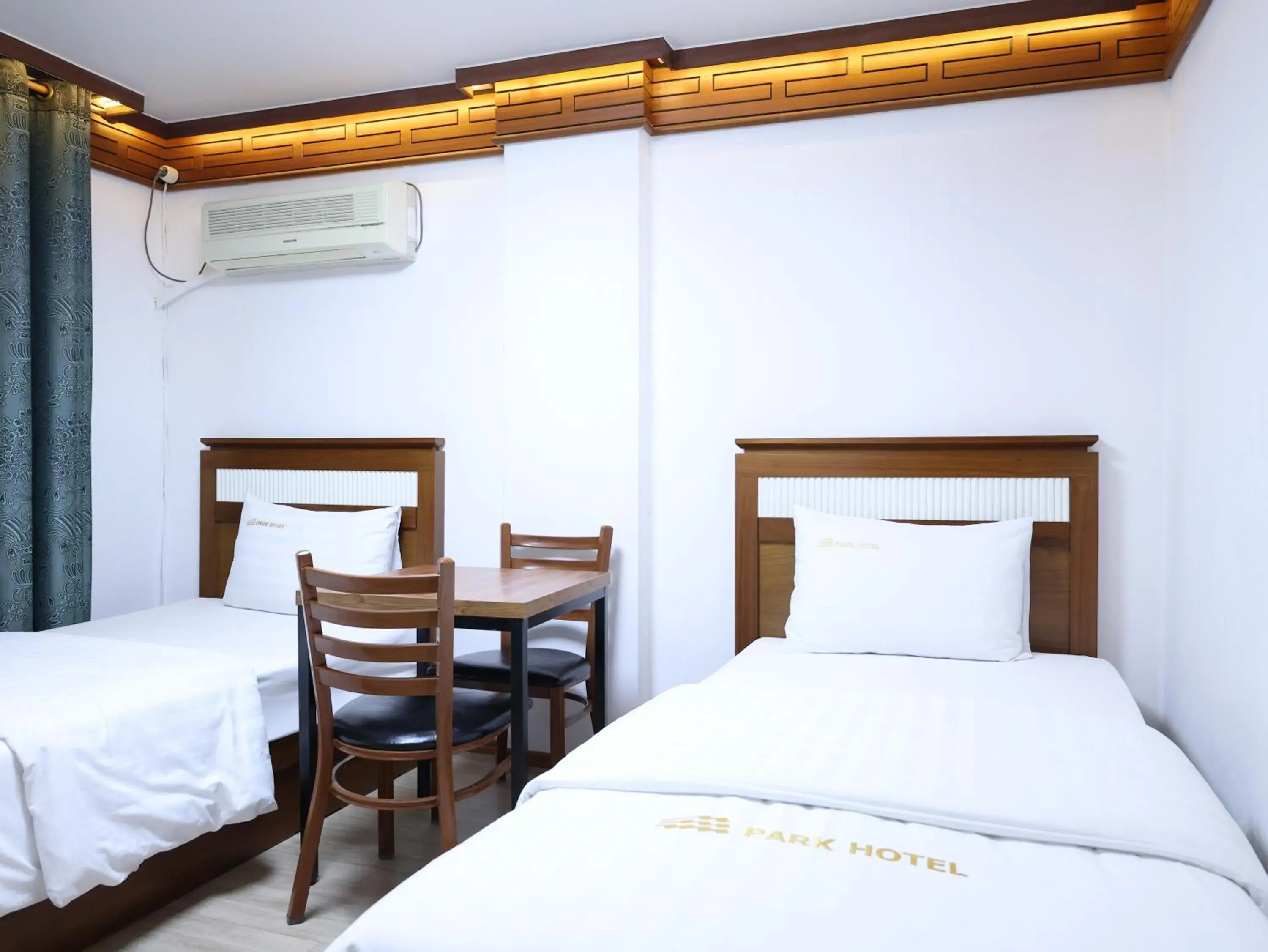 Bed in Goodstay Andong Park Hotel