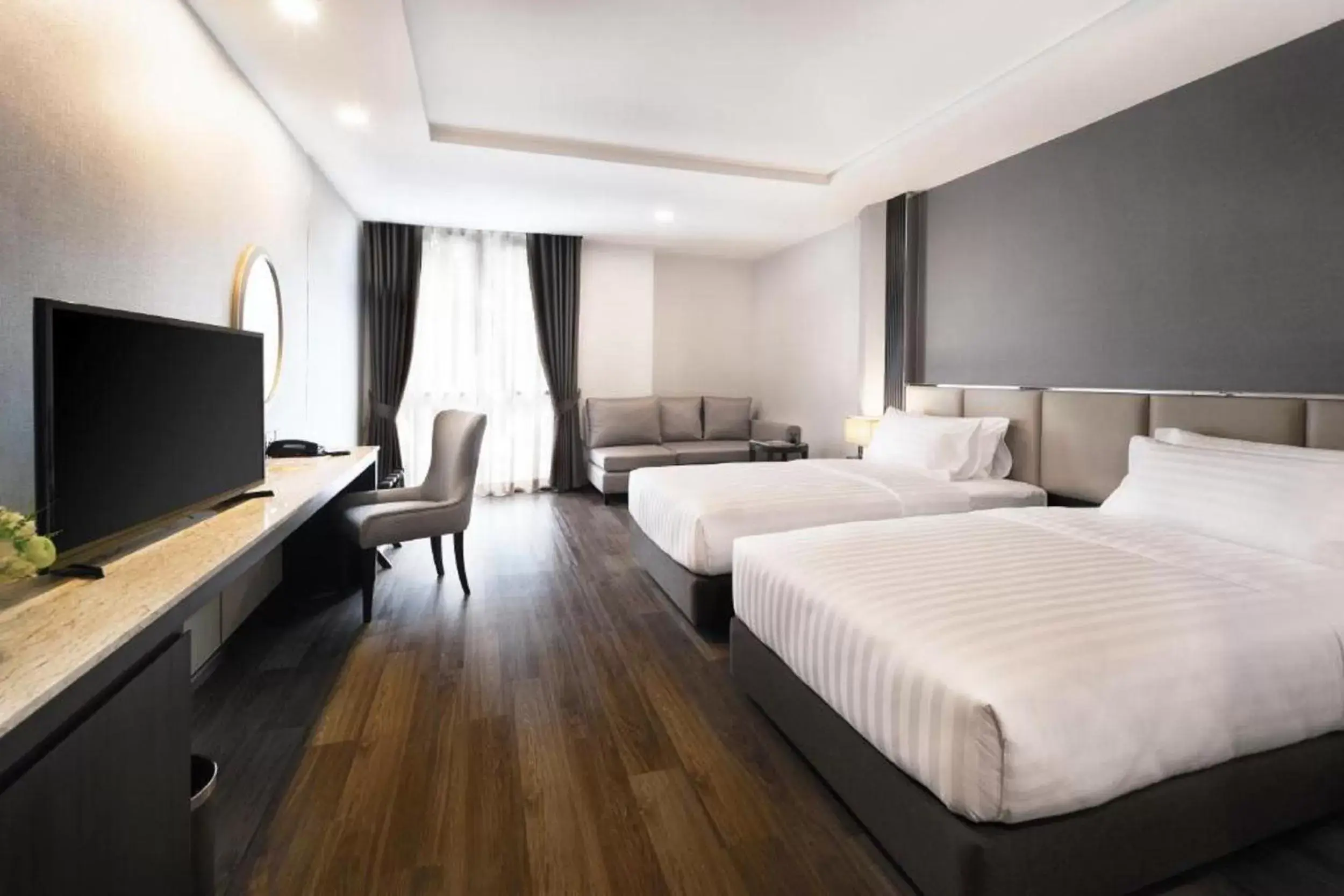 TV and multimedia, TV/Entertainment Center in SureStay Plus Hotel by Best Western Sukhumvit 2
