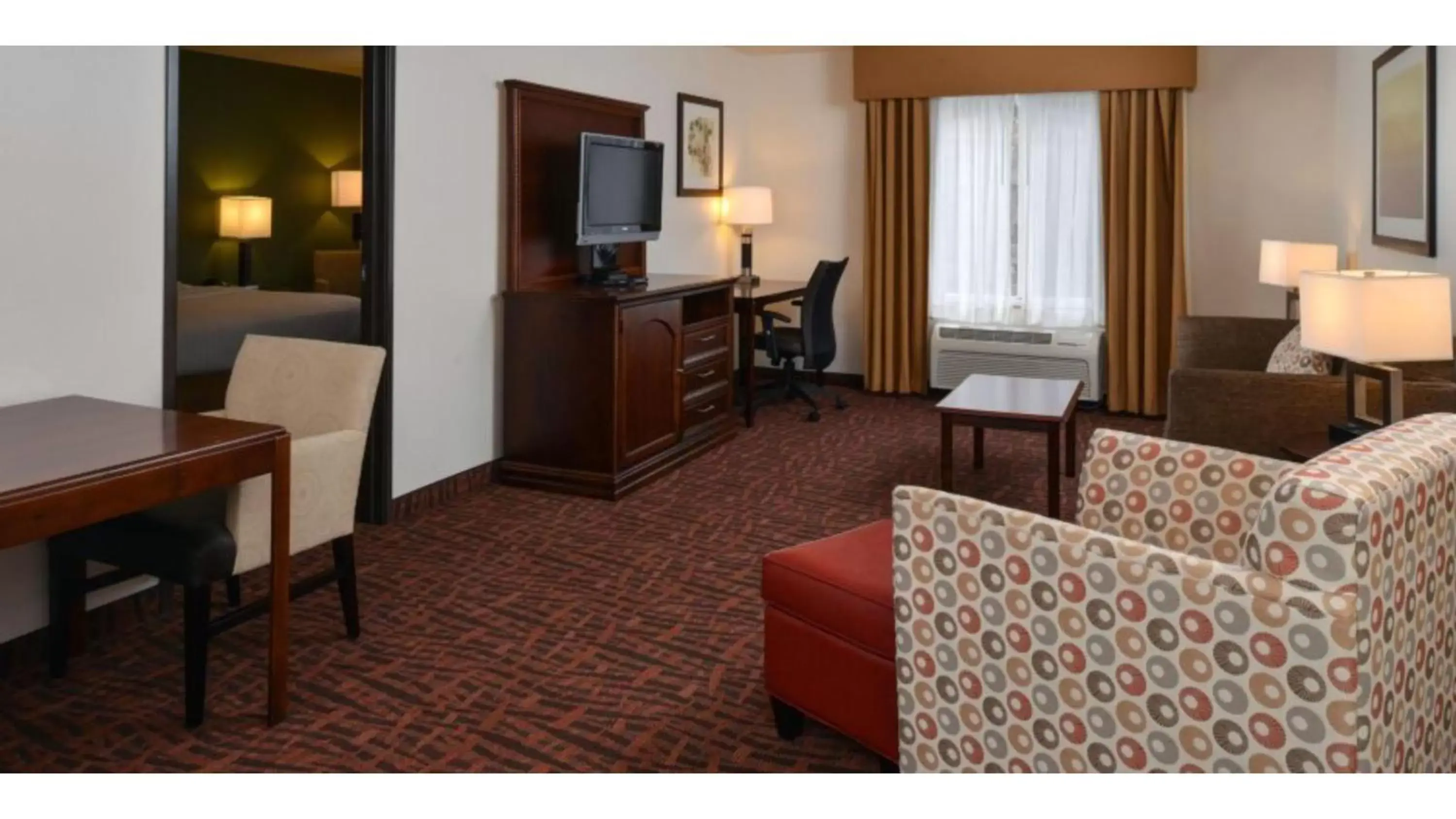Photo of the whole room, TV/Entertainment Center in Holiday Inn Express Hotel & Suites Cherry Hills, an IHG Hotel