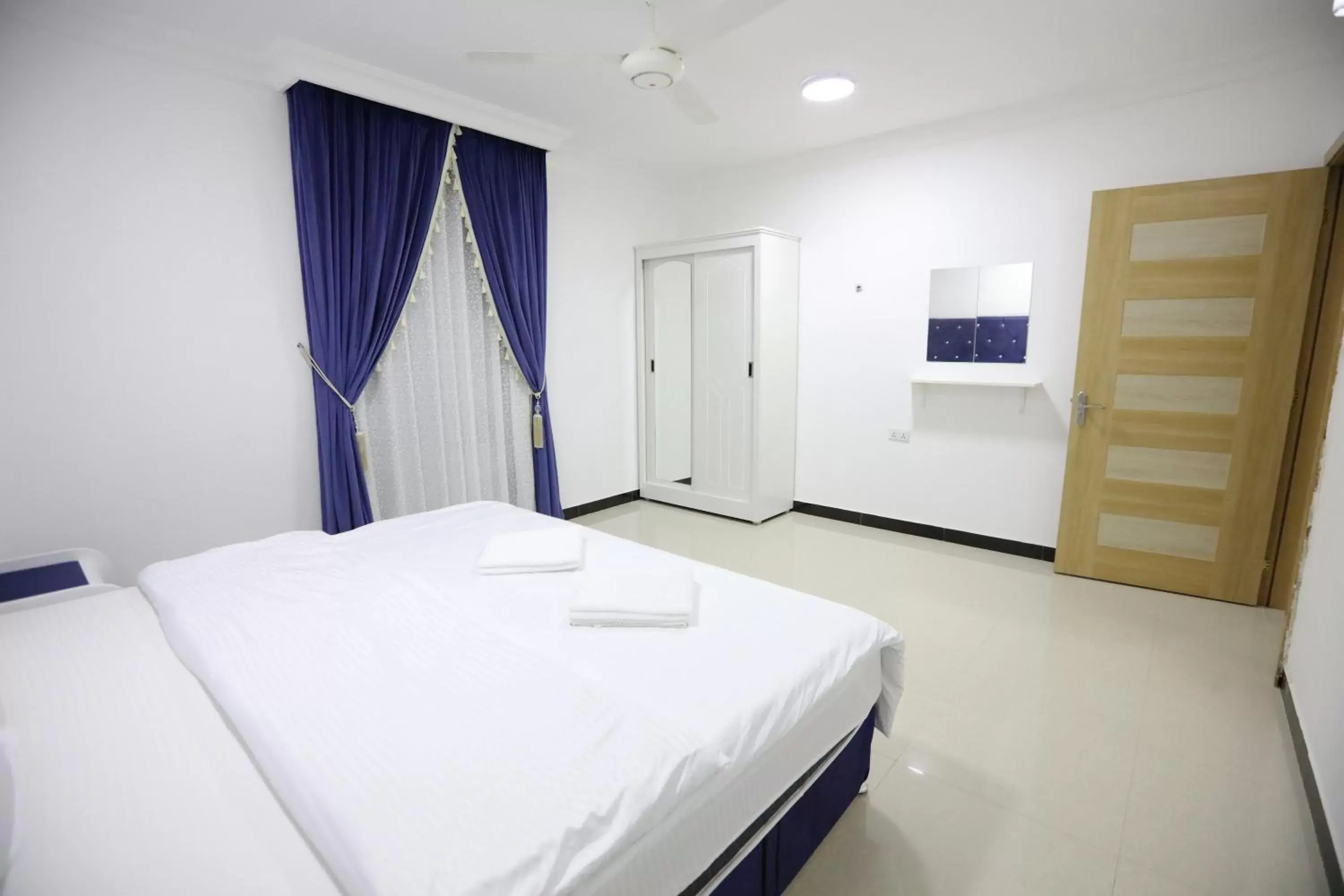 Bed in Al Rayyan Hotel Apartments Muscat