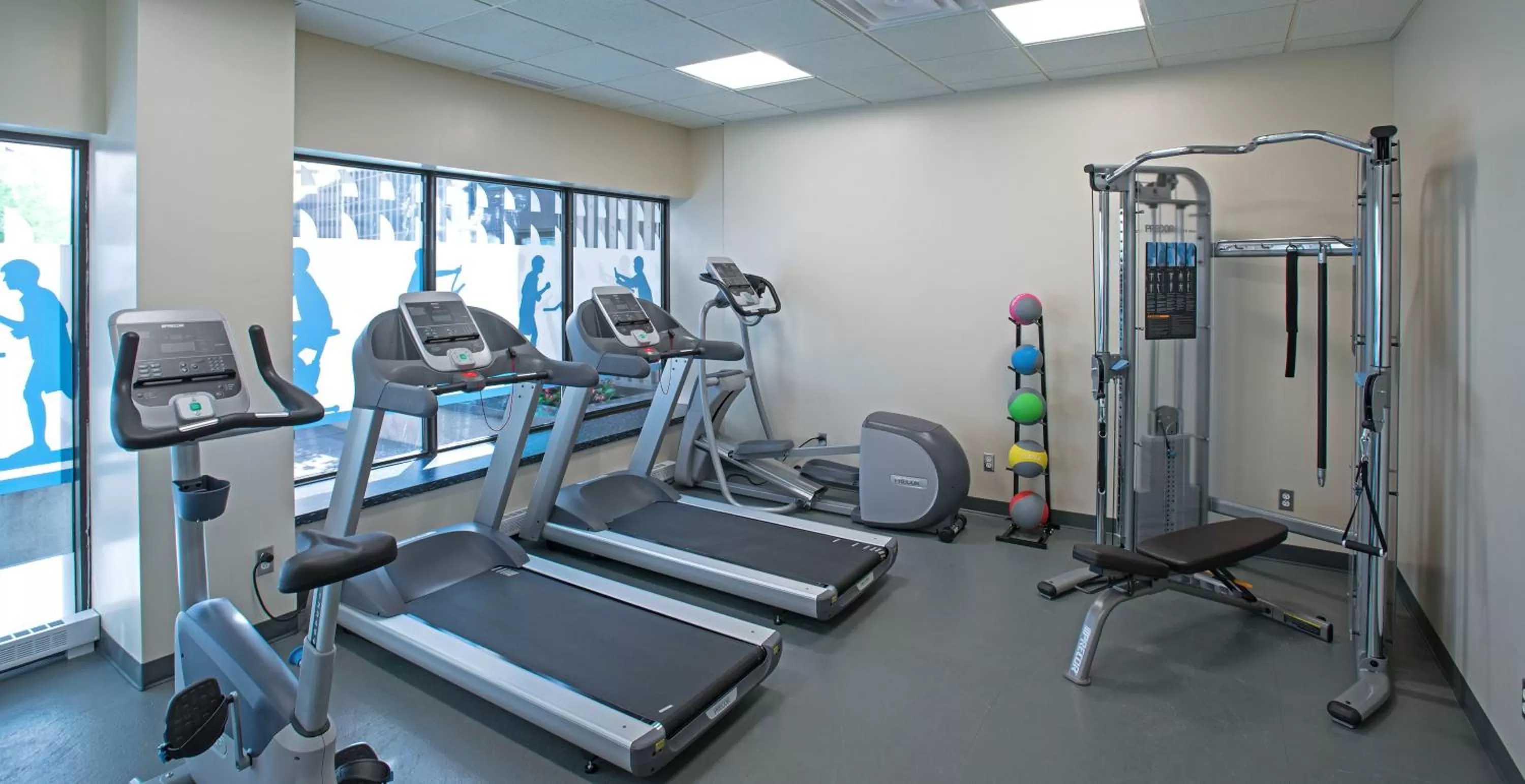 Fitness centre/facilities in L'Appartement Hôtel