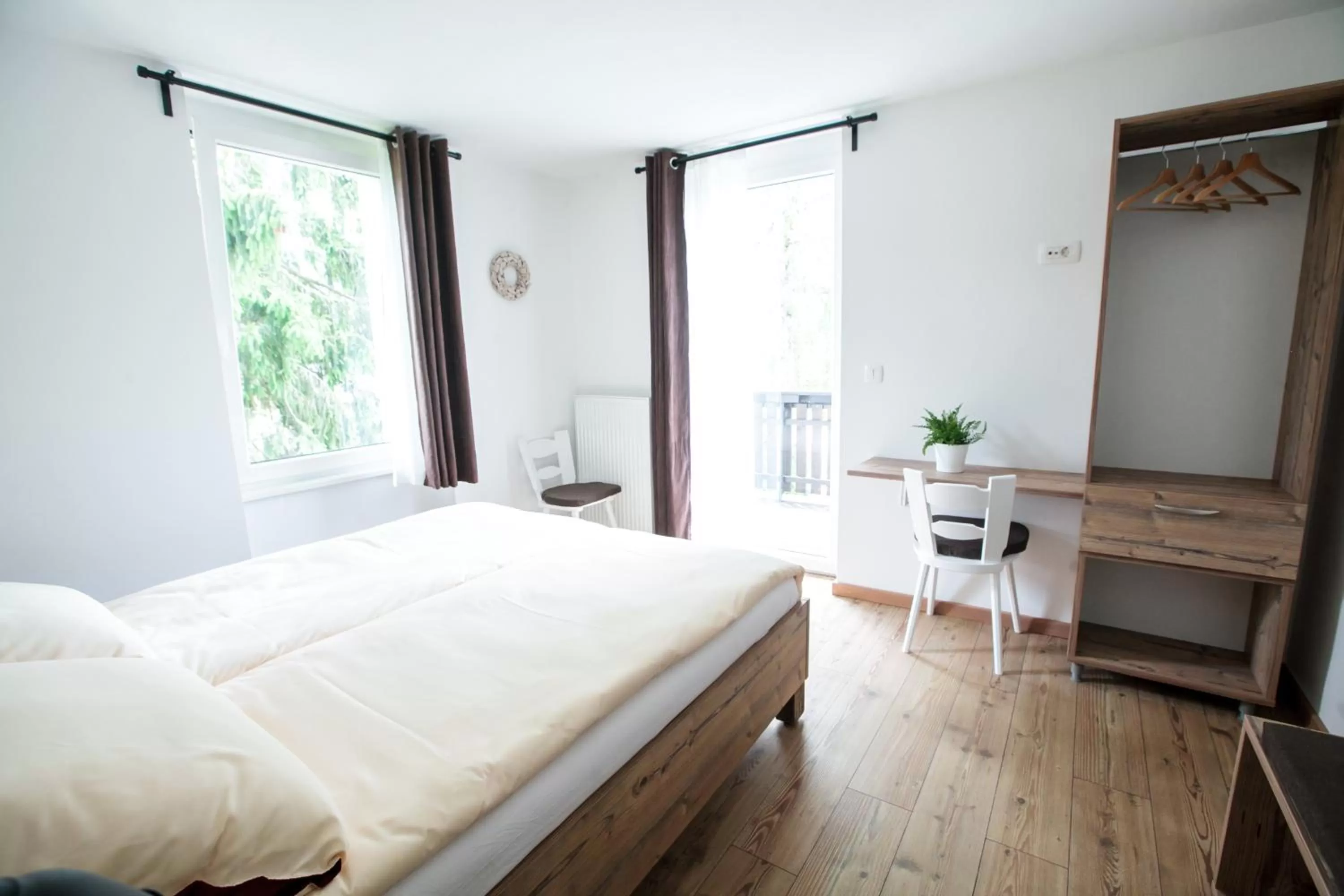 Bed in Hiša Poljana Rooms