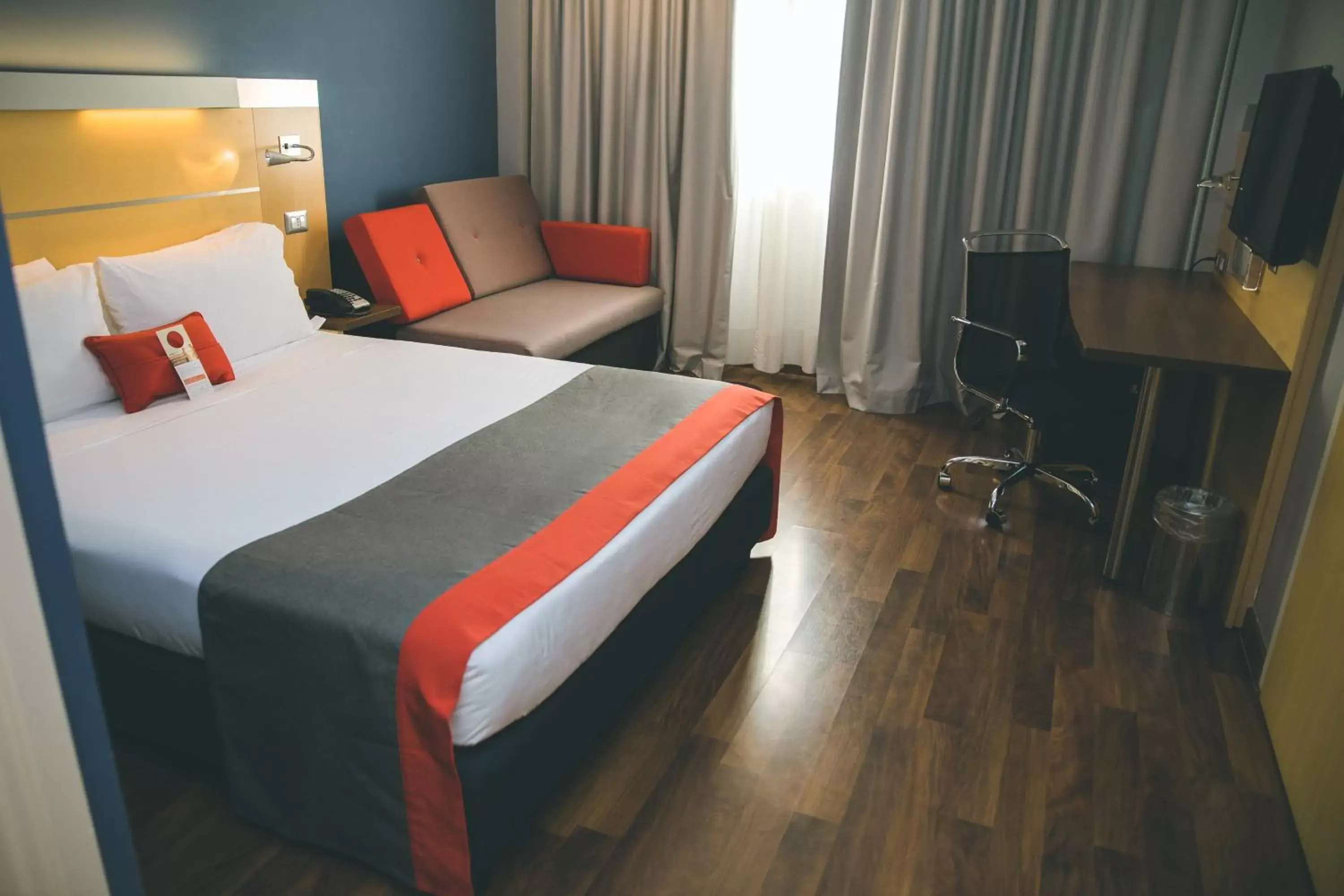 Photo of the whole room, Bed in Holiday Inn Express Milan-Malpensa Airport, an IHG Hotel