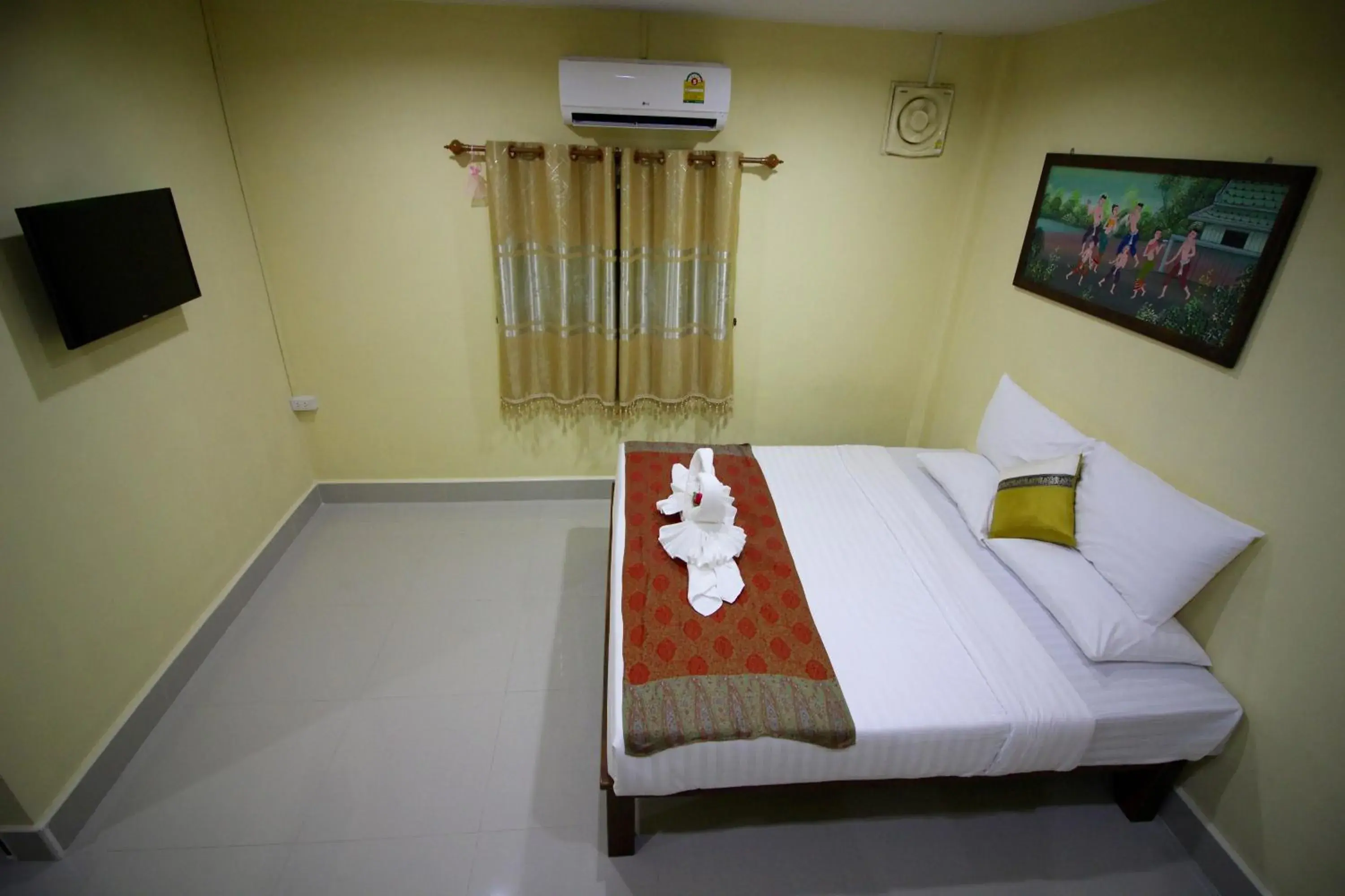 Bed in Srisiam Resort