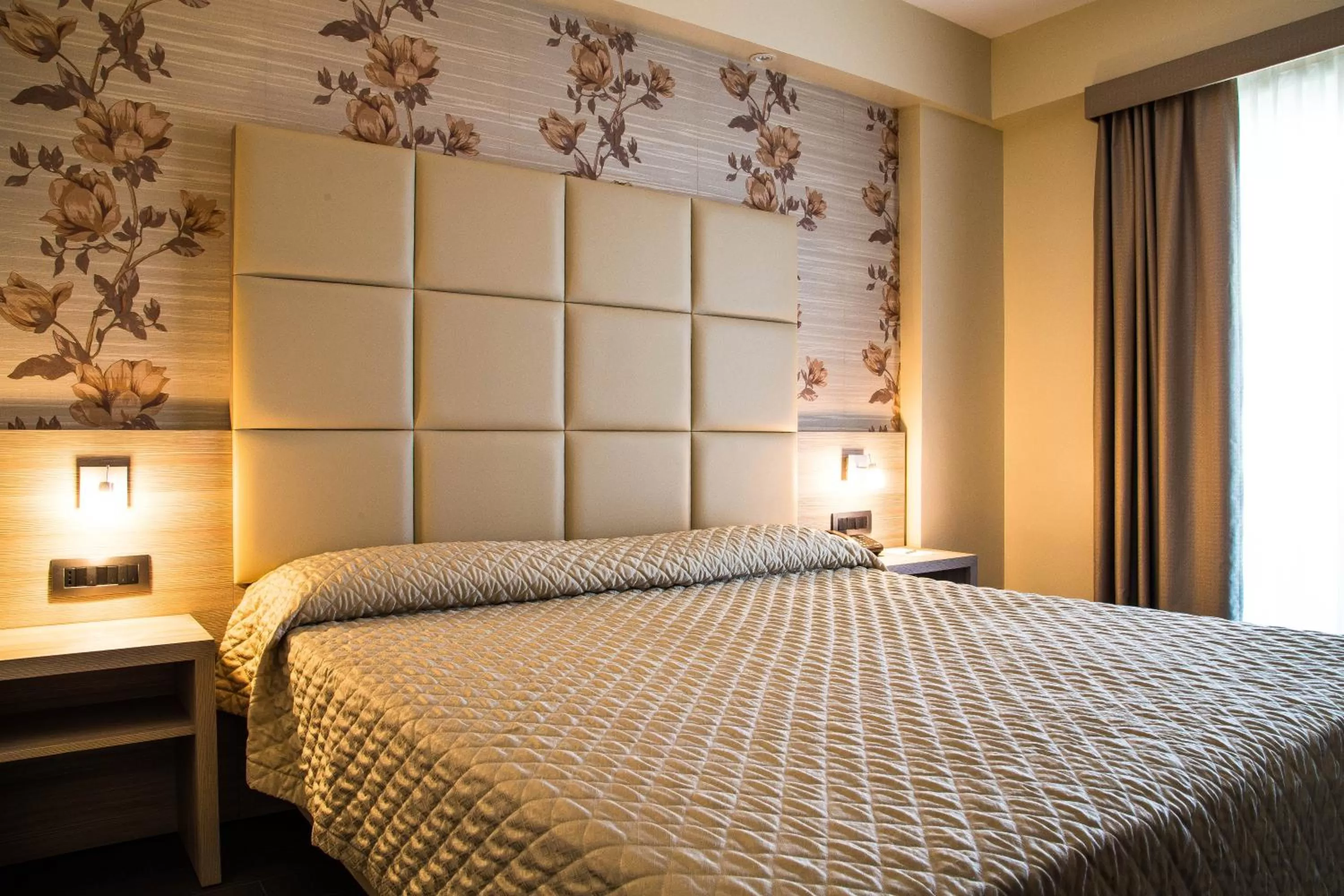 Bed in Hotel Pineta Palace