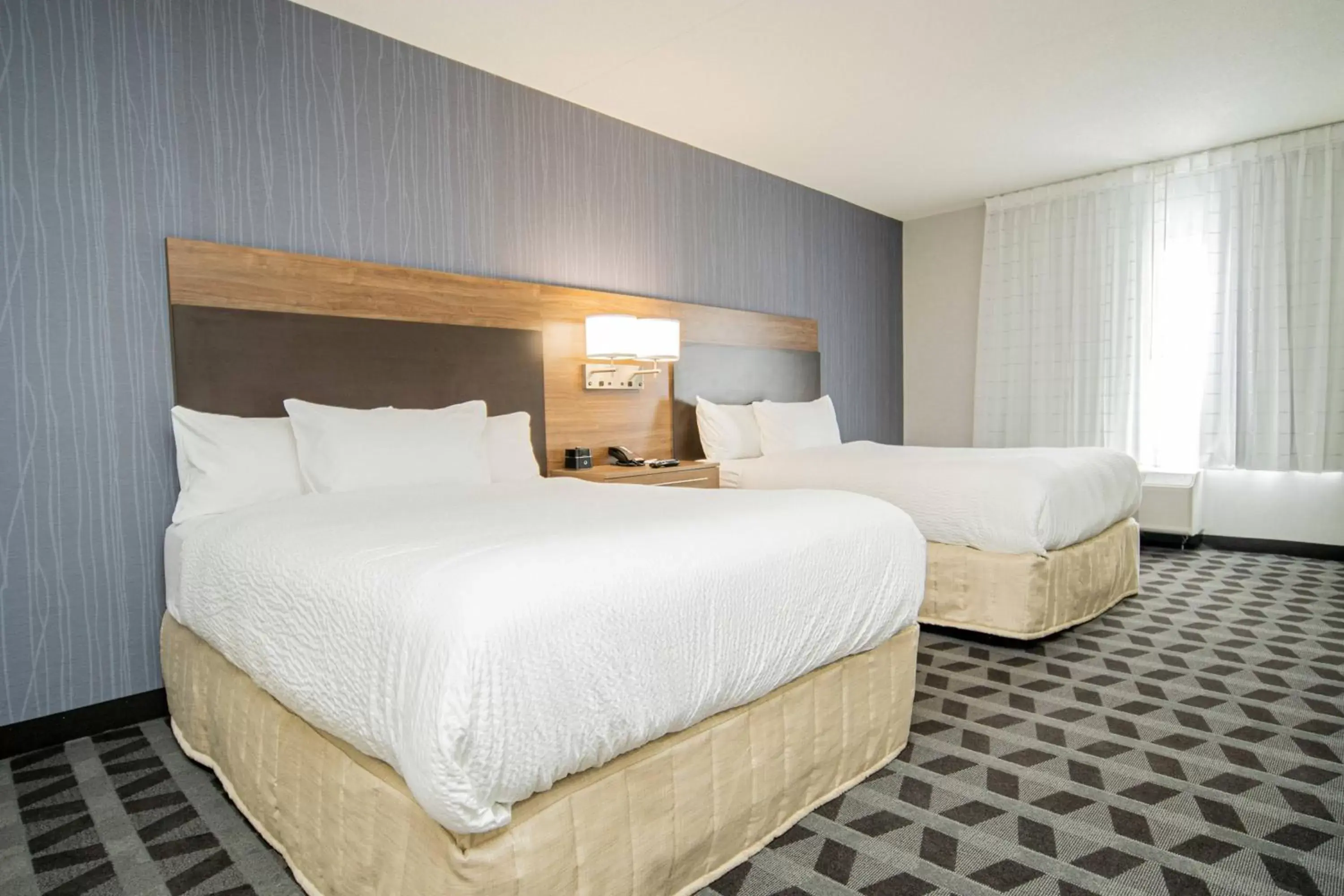 Bedroom, Bed in TownePlace Suites by Marriott Brantford and Conference Centre