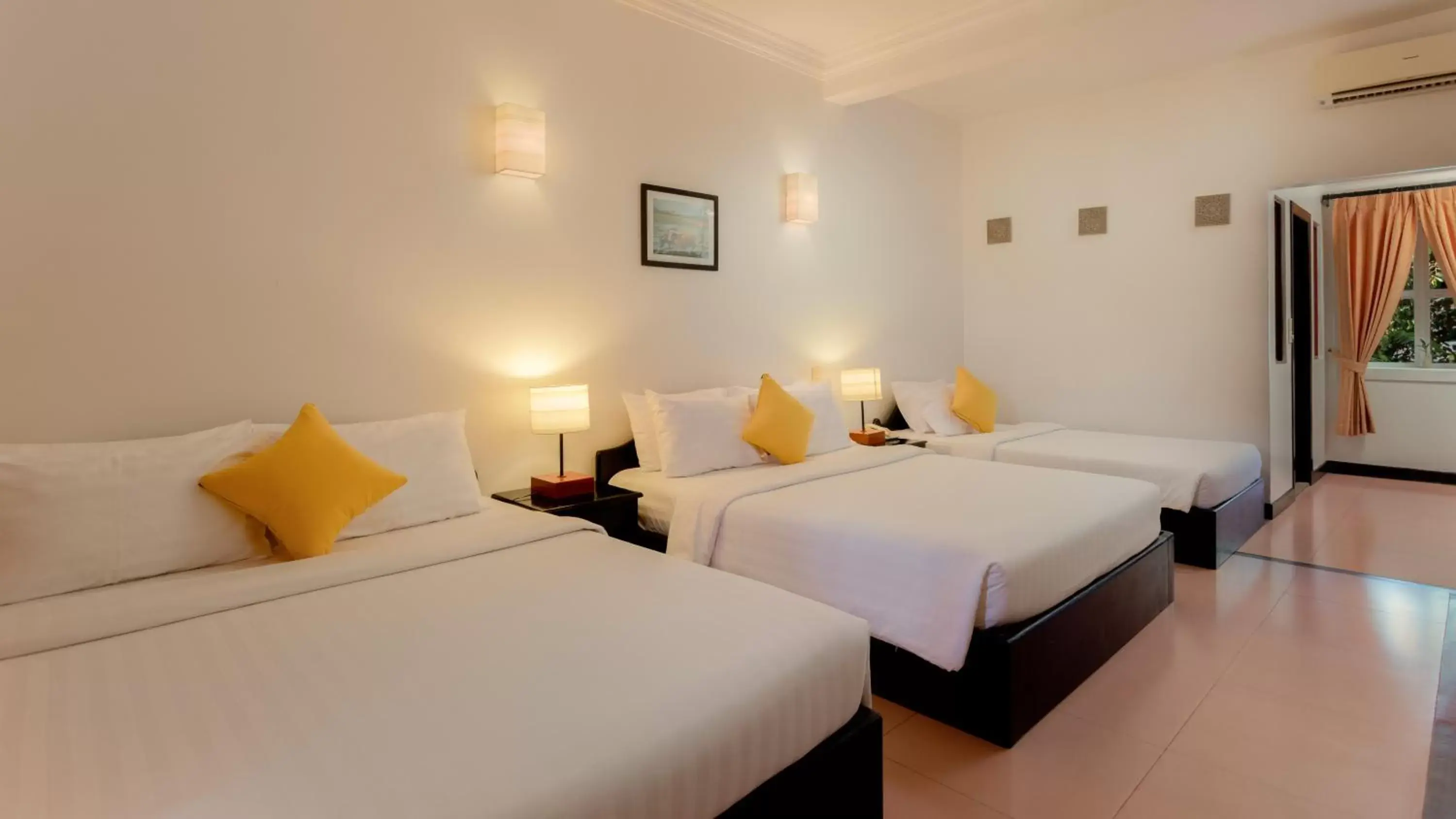 Bed in Amber Angkor Villa Hotel & Spa