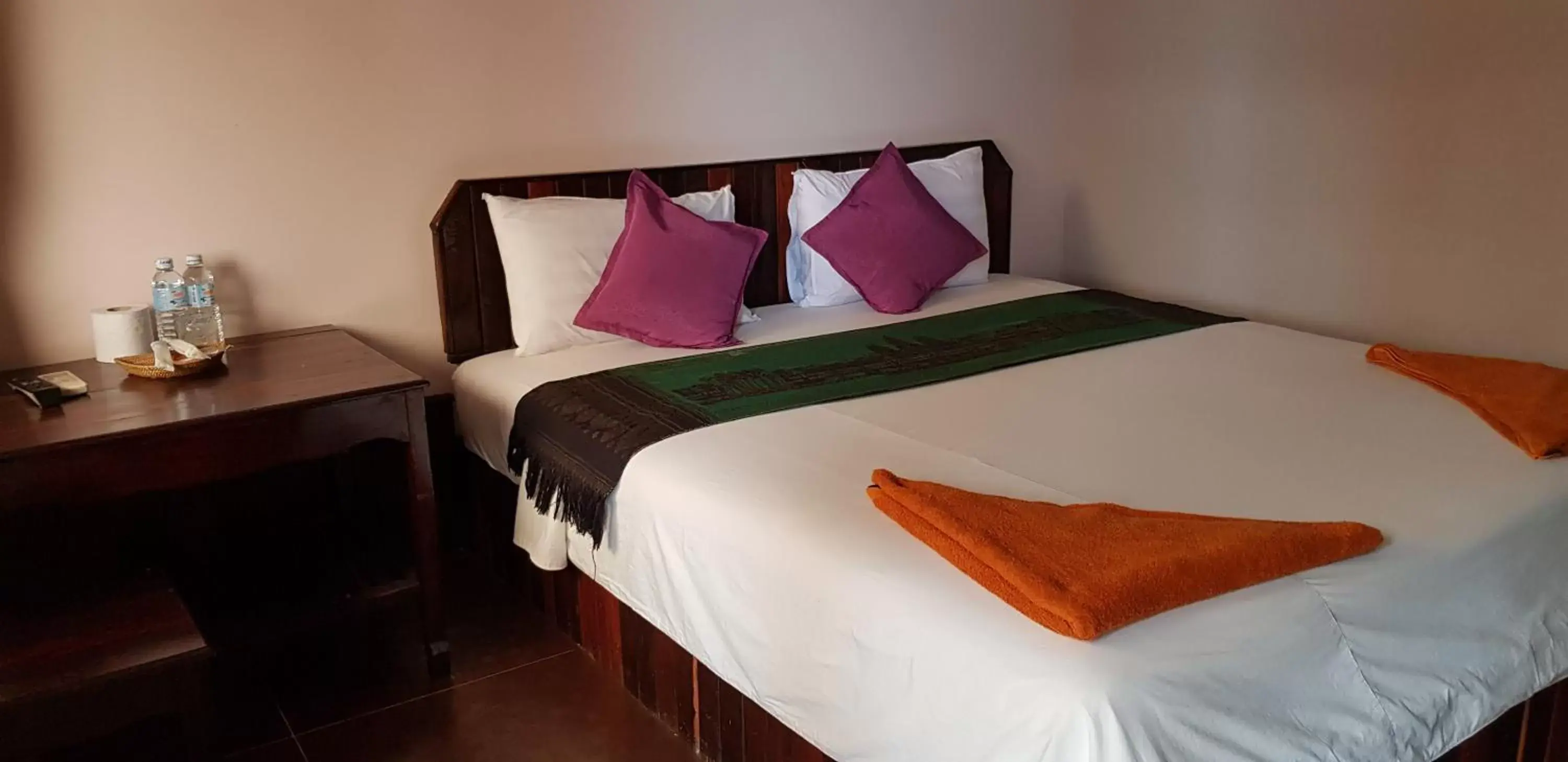 Bed in Apex Koh Kong Hotel