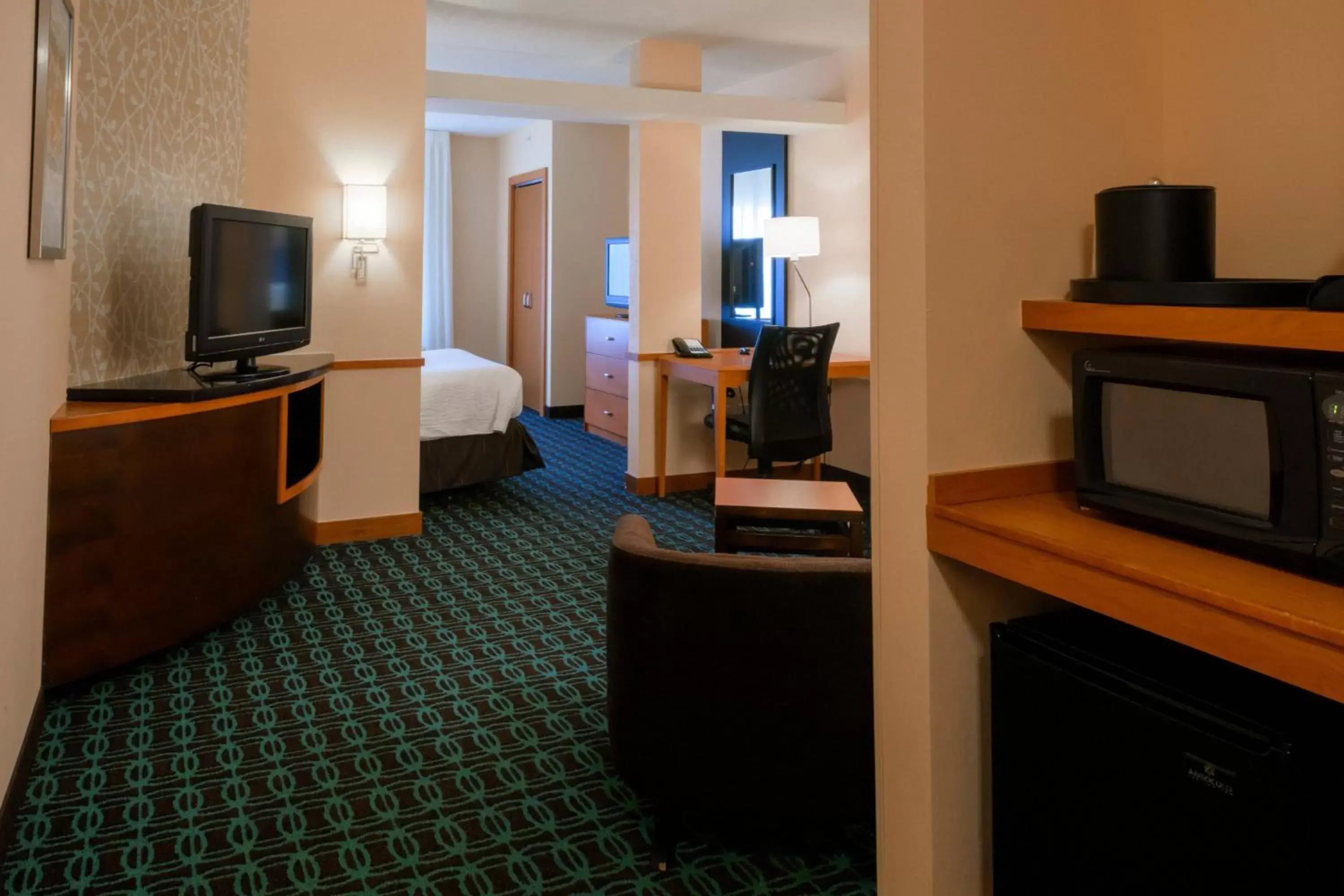 Photo of the whole room, TV/Entertainment Center in Fairfield Inn & Suites Kennett Square