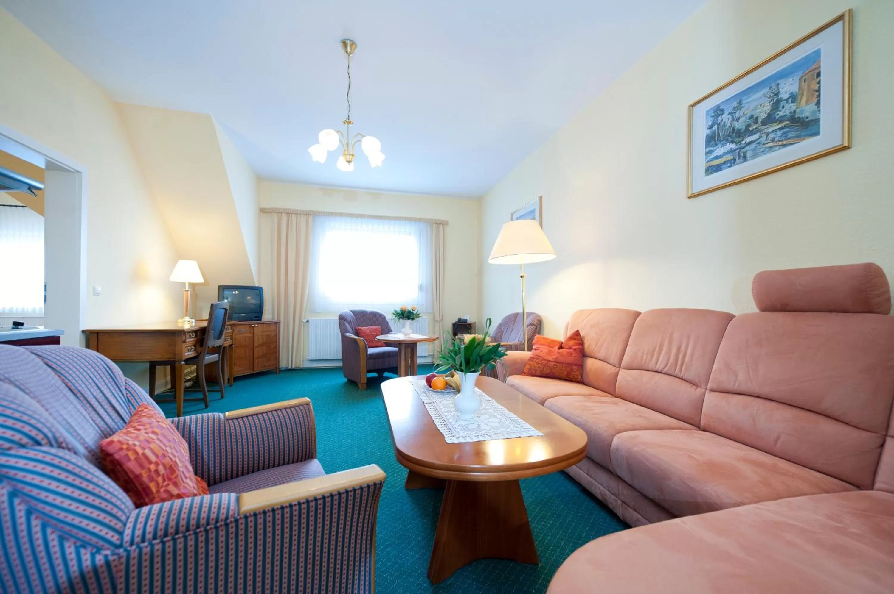 Communal lounge/ TV room in Hotel Spöttel