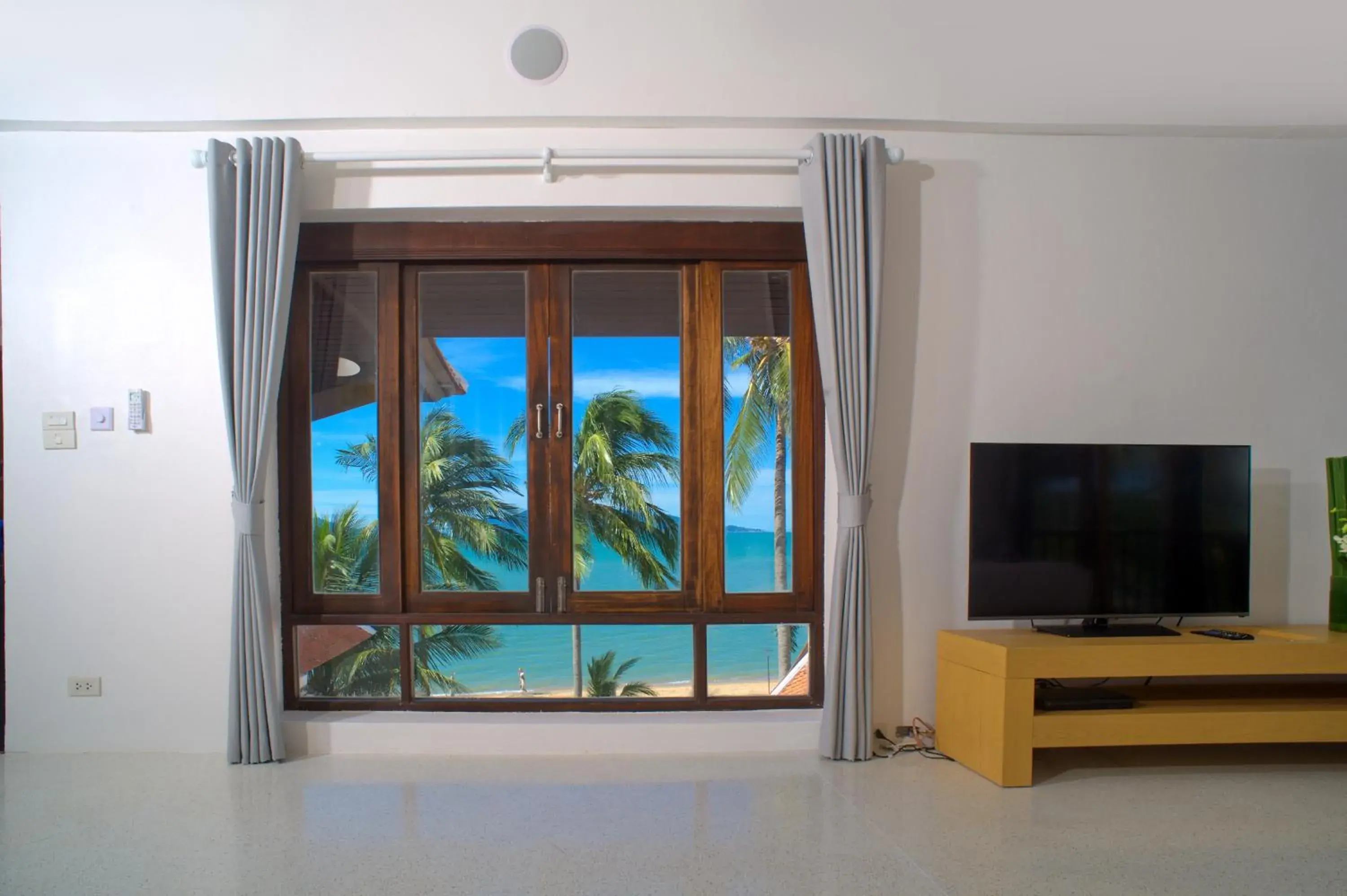 TV and multimedia, TV/Entertainment Center in Baan Bophut Beach Hotel Samui - SHA Extra Plus