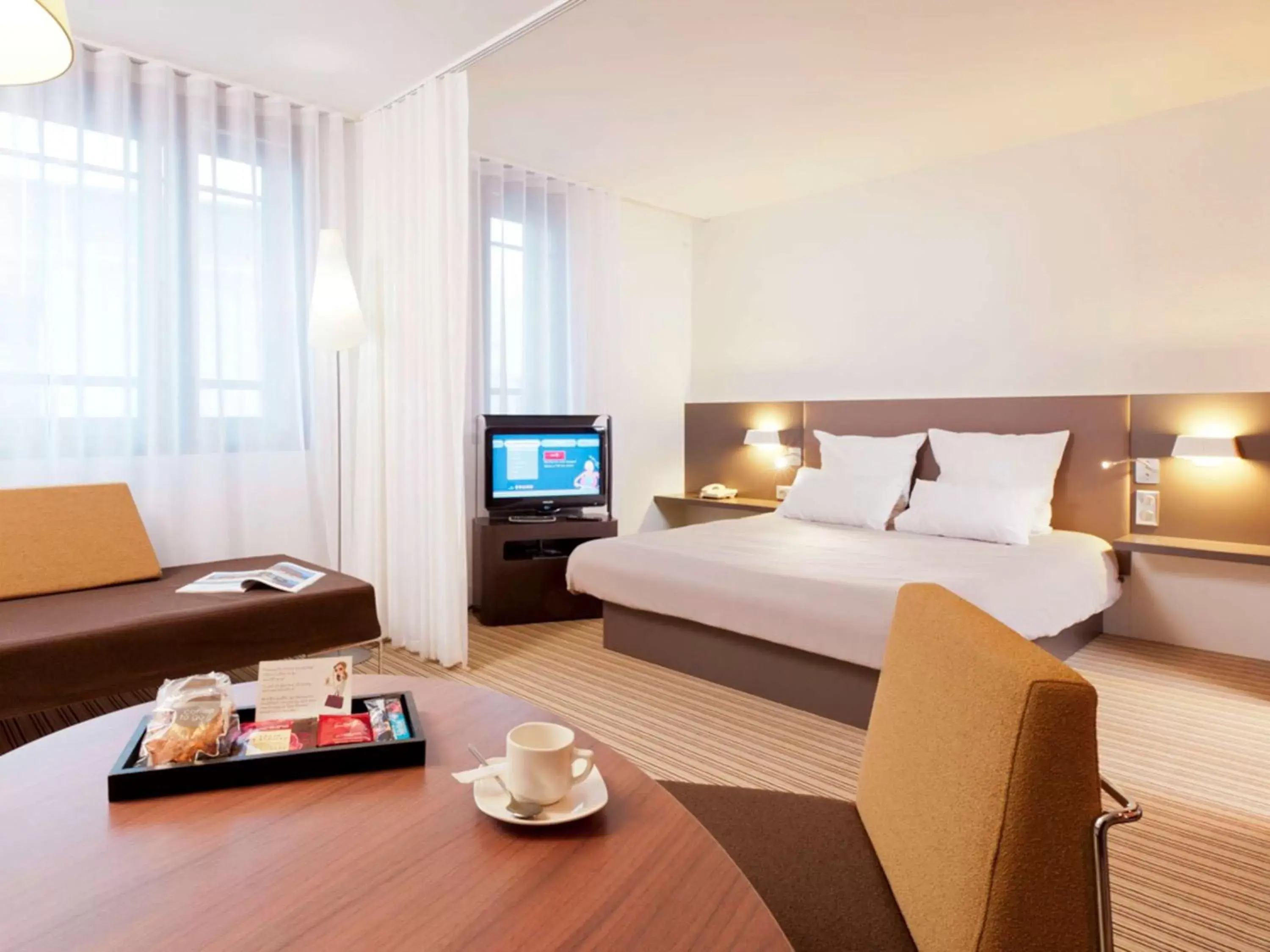 Photo of the whole room, Bed in Novotel Suites Cannes Centre