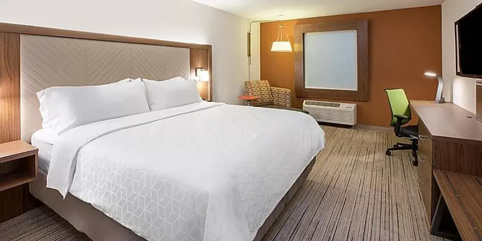 Bed in Holiday Inn Express & Suites Dayton North - Vandalia, an IHG Hotel