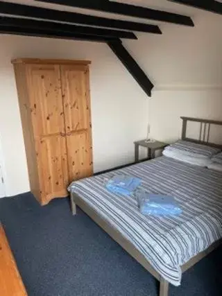 Bed in Discovery Accommodation