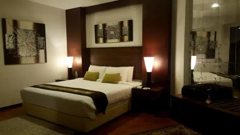 Bed in Samsuria Beach Resort & Residence