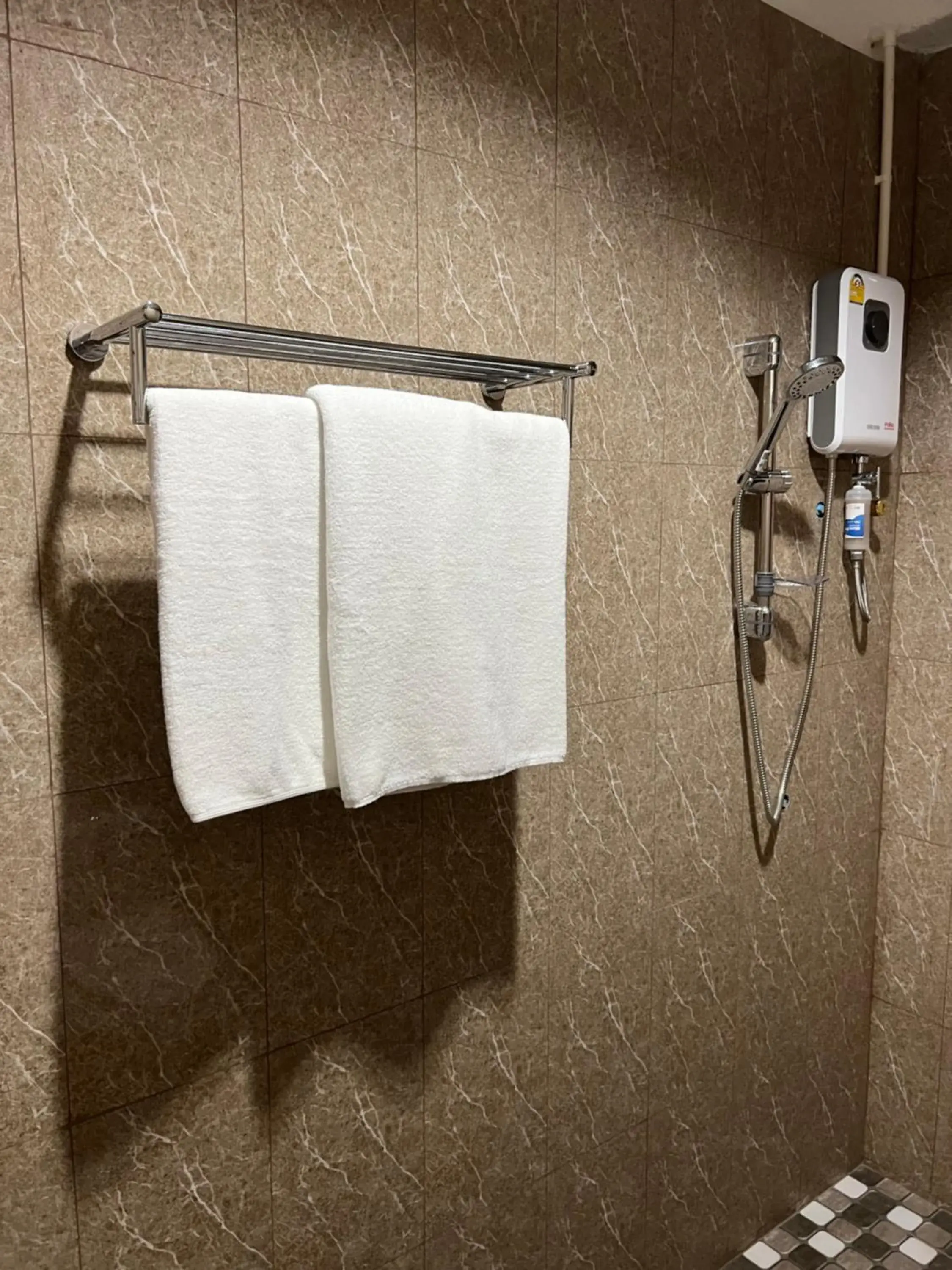 towels, Bathroom in Mall Suites Hotel