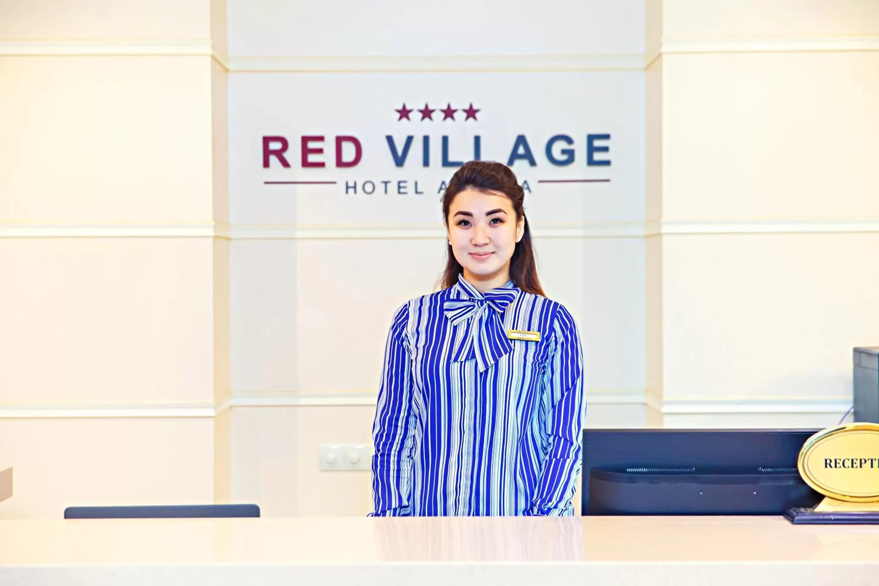 Staff in Red Village Hotel