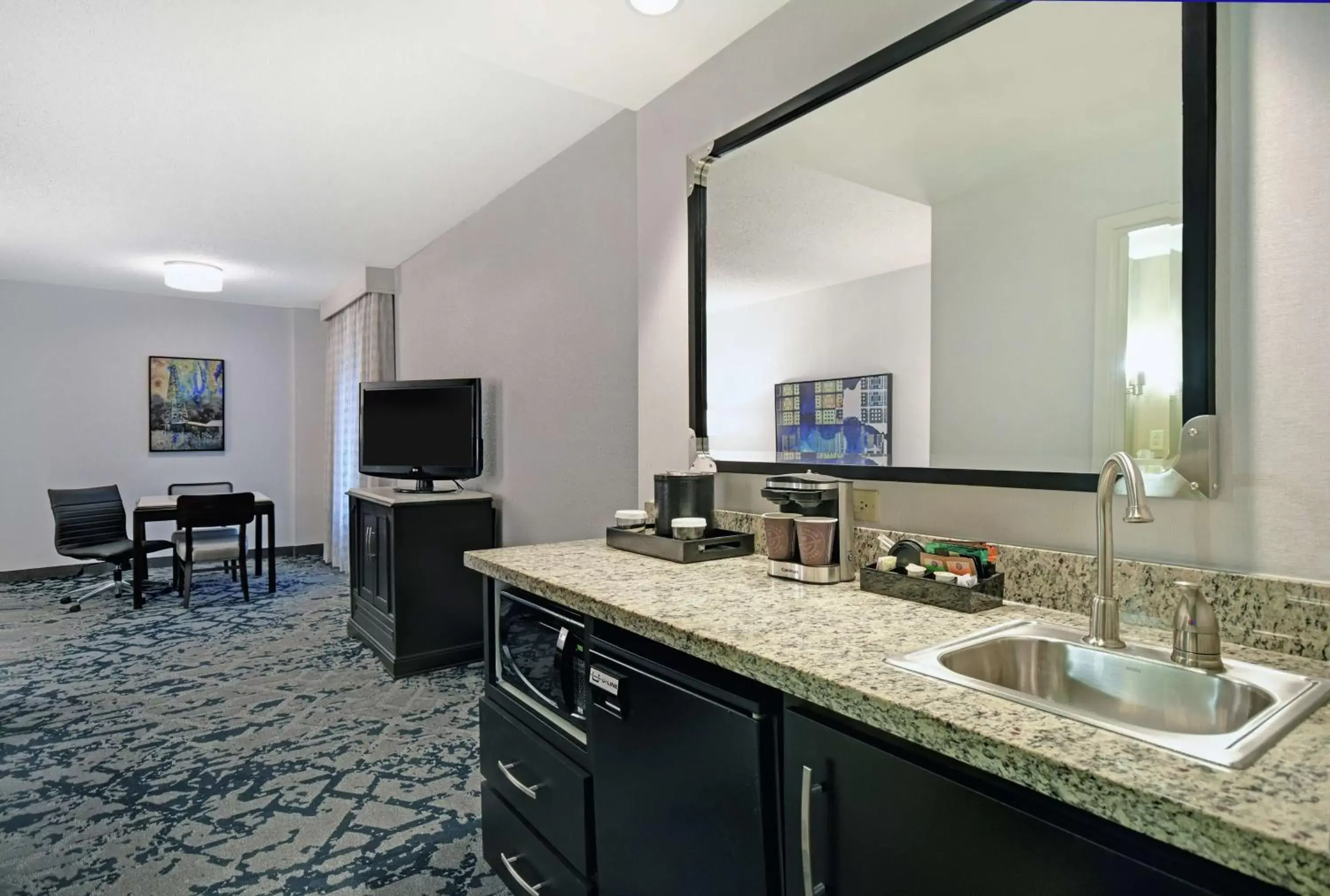 Bedroom, Kitchen/Kitchenette in Embassy Suites Charleston