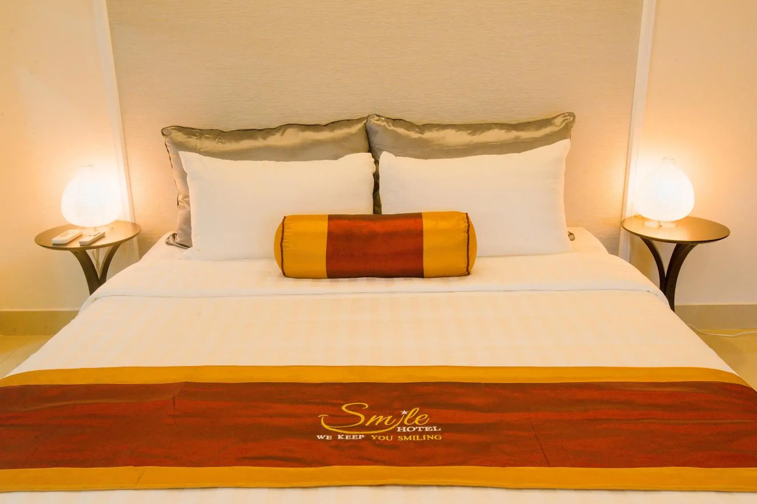 Bed in Smile Hotel