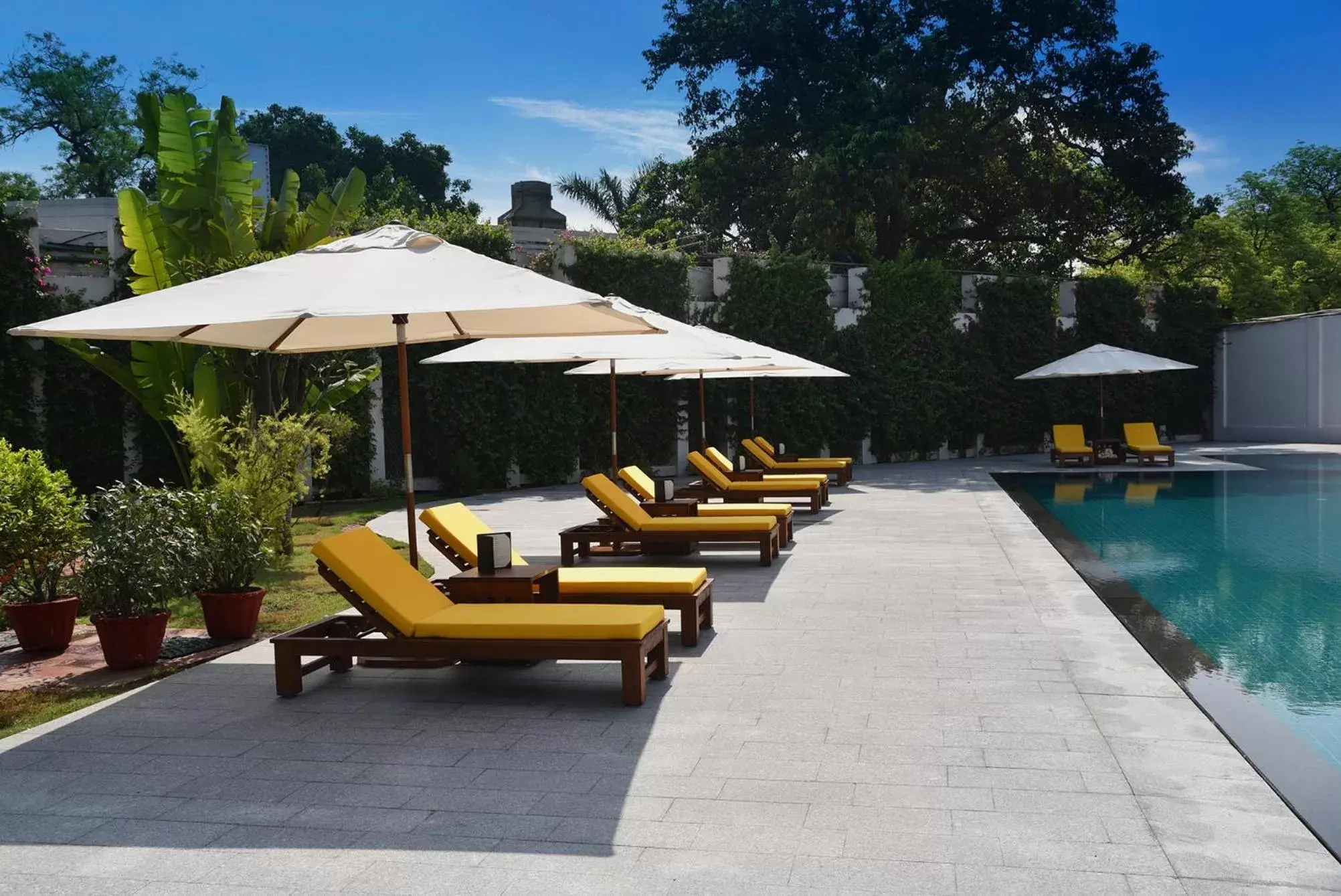 Patio, Swimming Pool in Maidens Hotel New Delhi