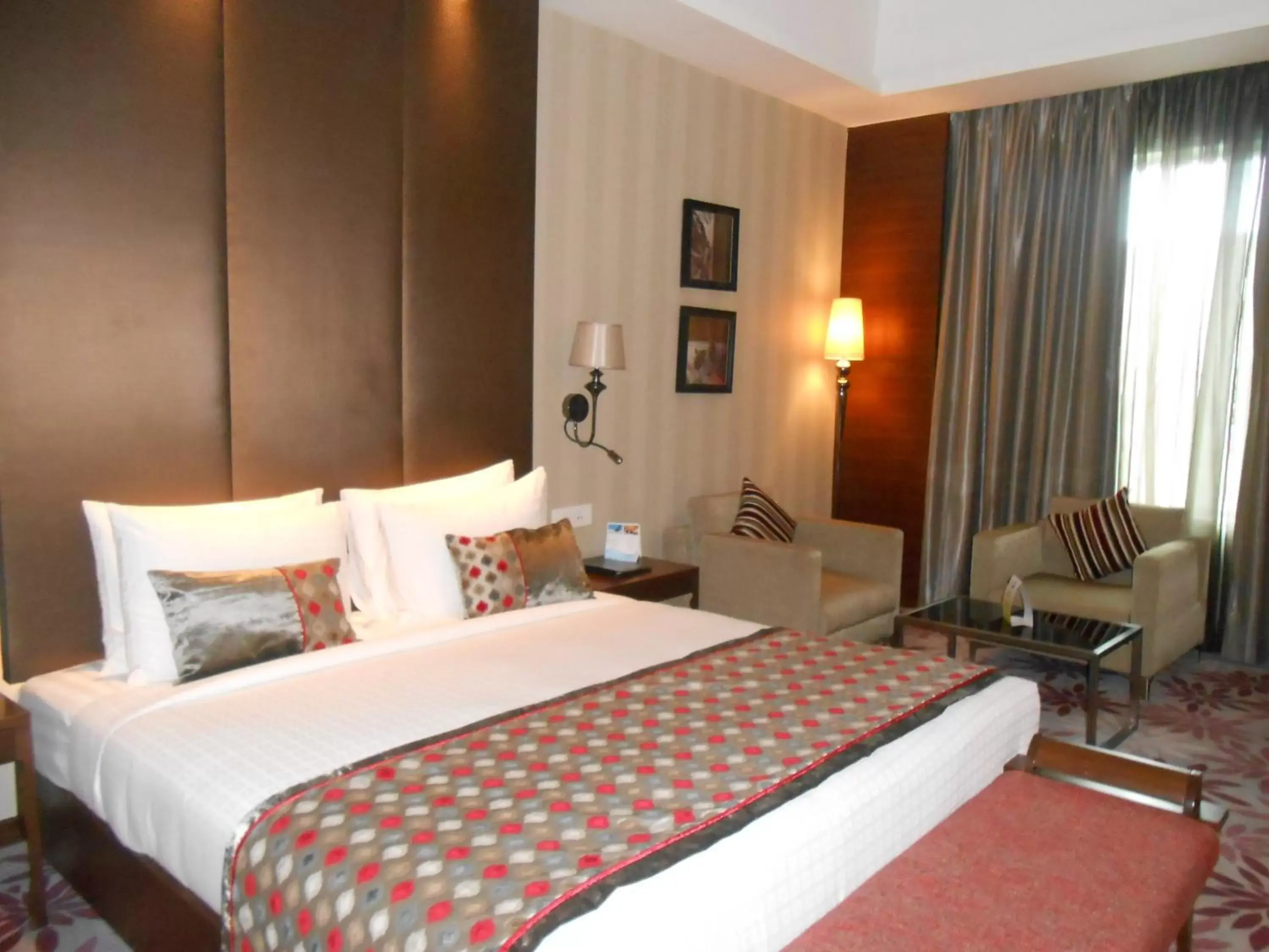 Photo of the whole room, Bed in Pride Plaza Hotel, Kolkata