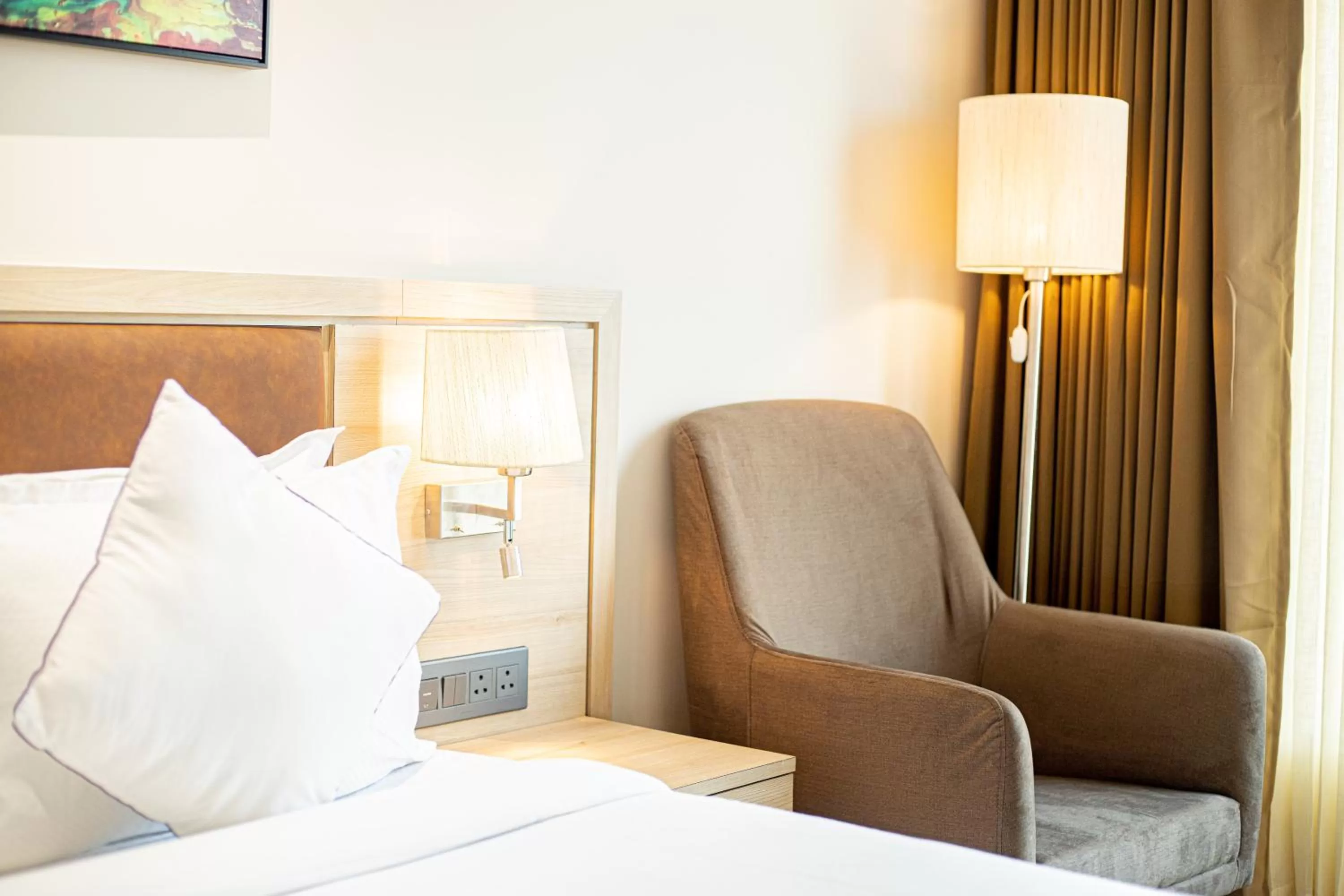 Seating area, Bed in The Monarch at Chakan MIDC, Pune