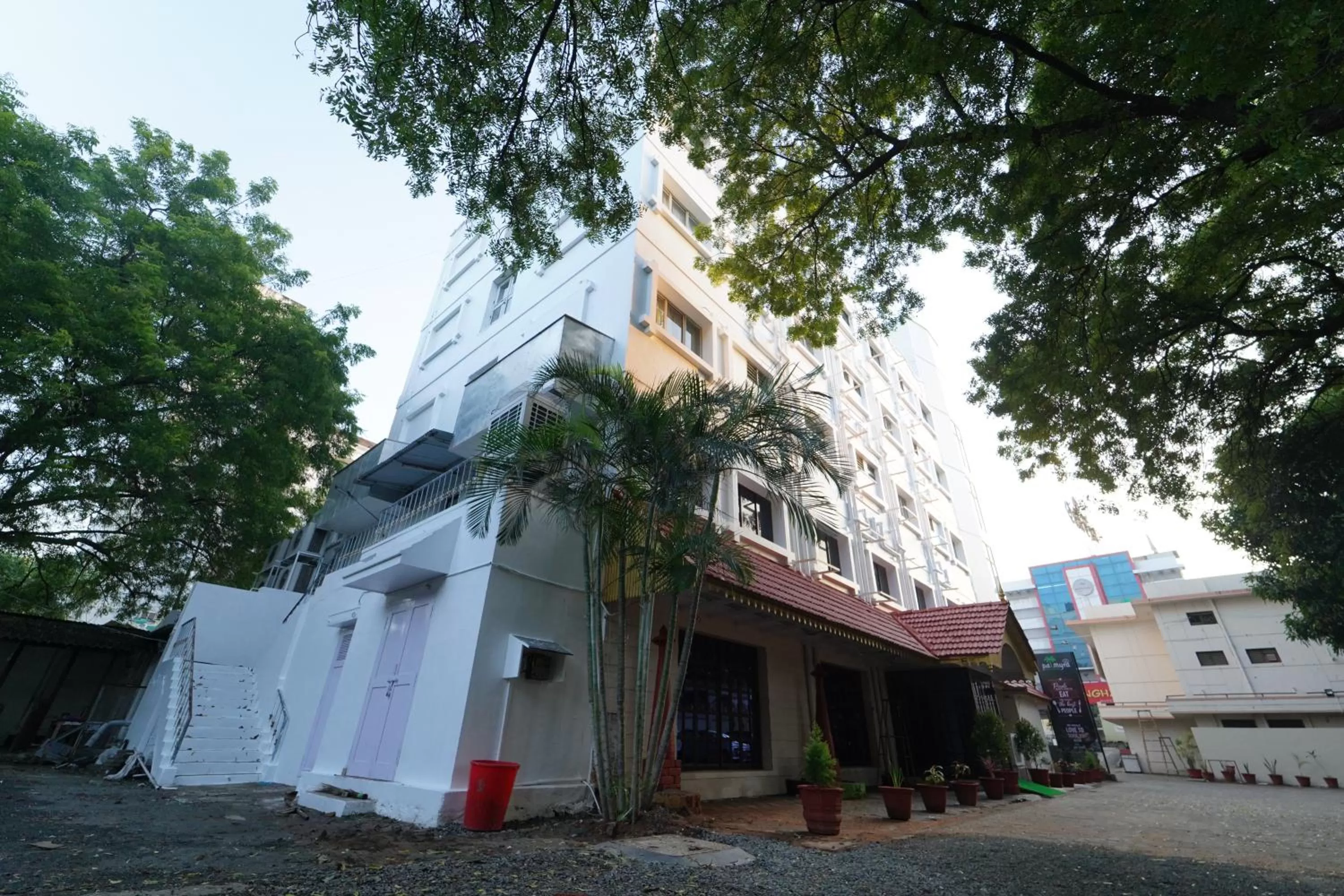 Property building in Hotel Palmyra Grand Inn