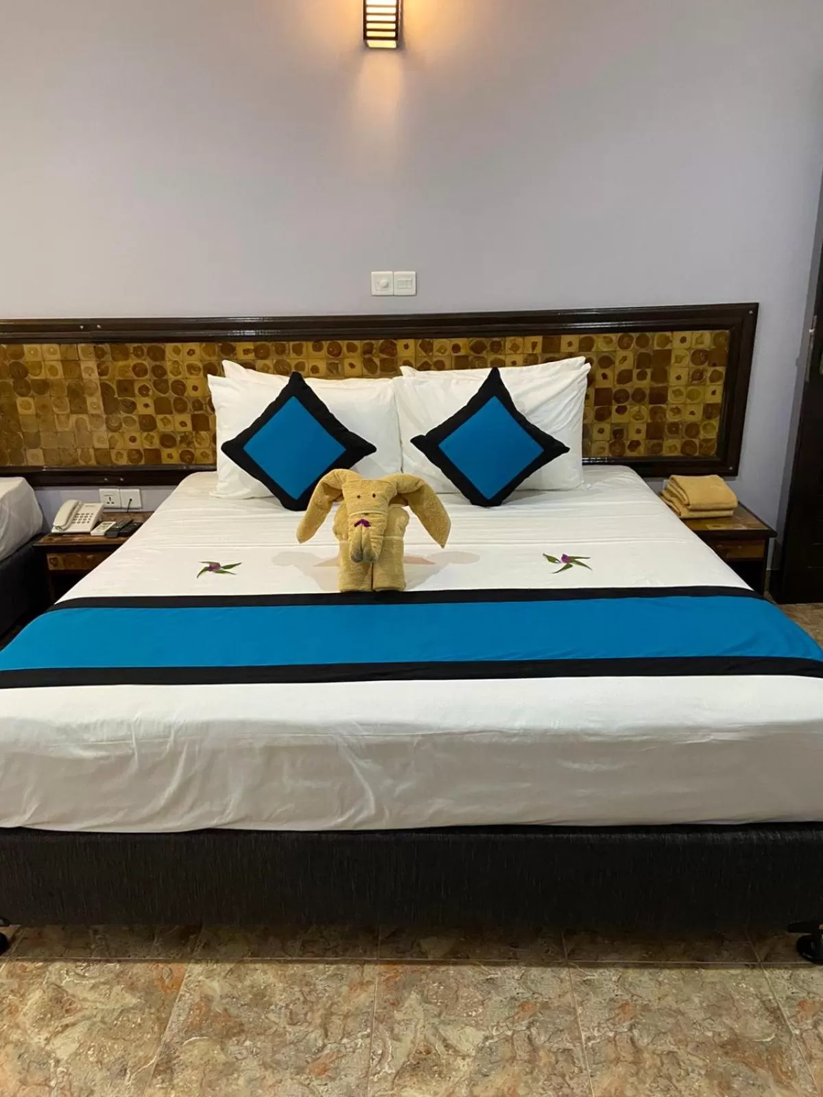 Bed in Blue Sand Beach Resort