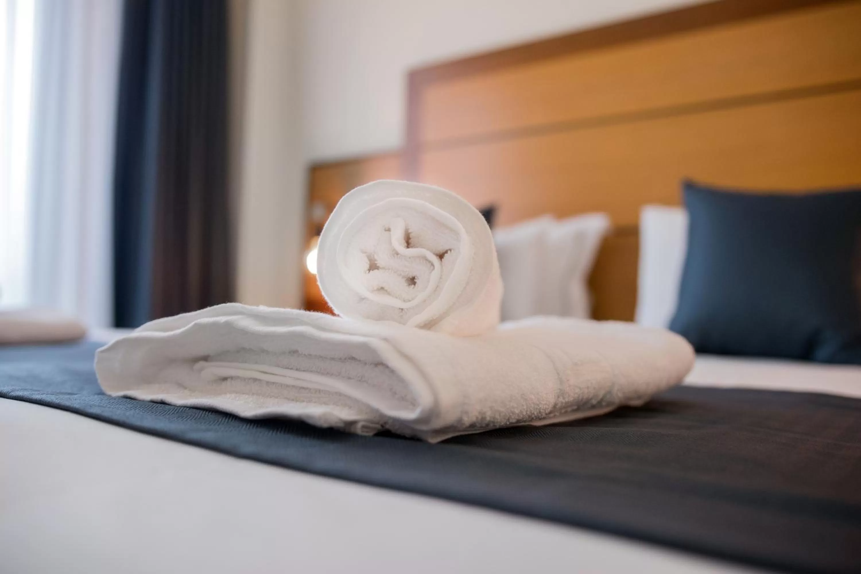 Bed in Manousos City Hotel