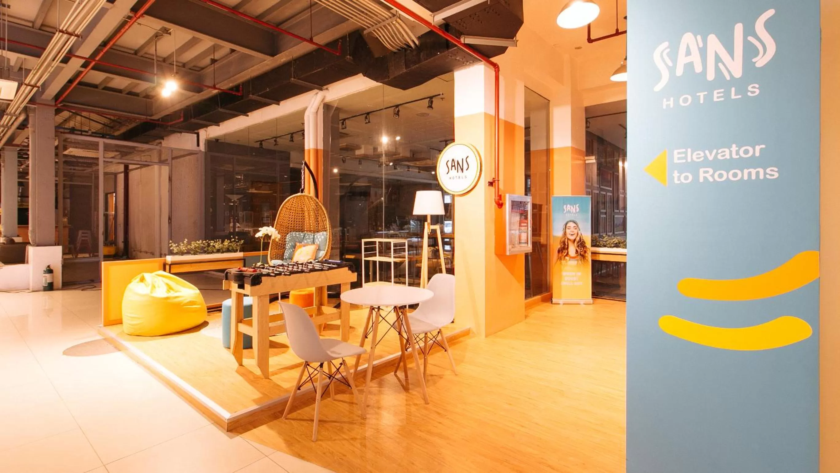 Seating area in Sans Hotel Laperal Manila