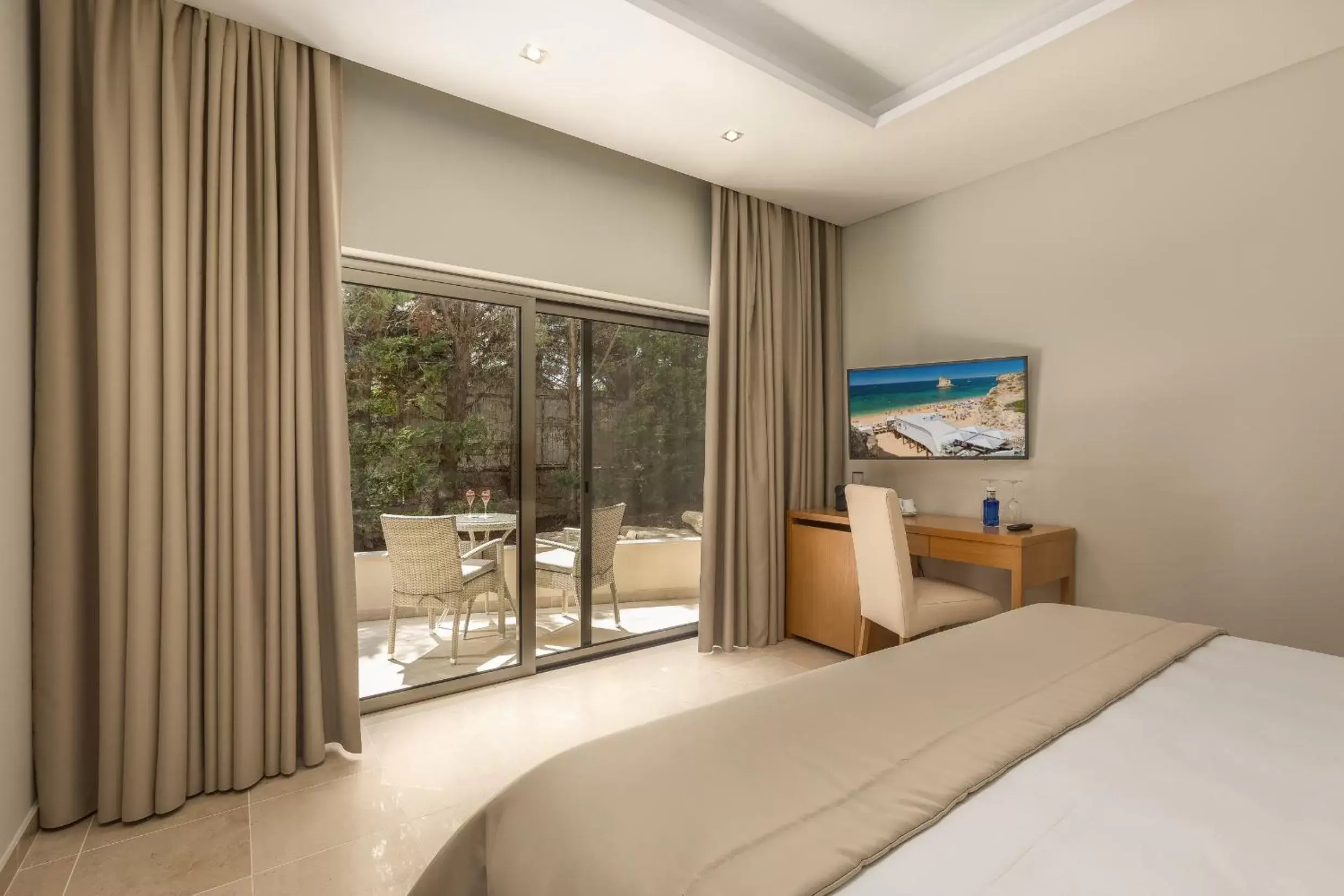 Bedroom in Caneiros Luxury House & Suites