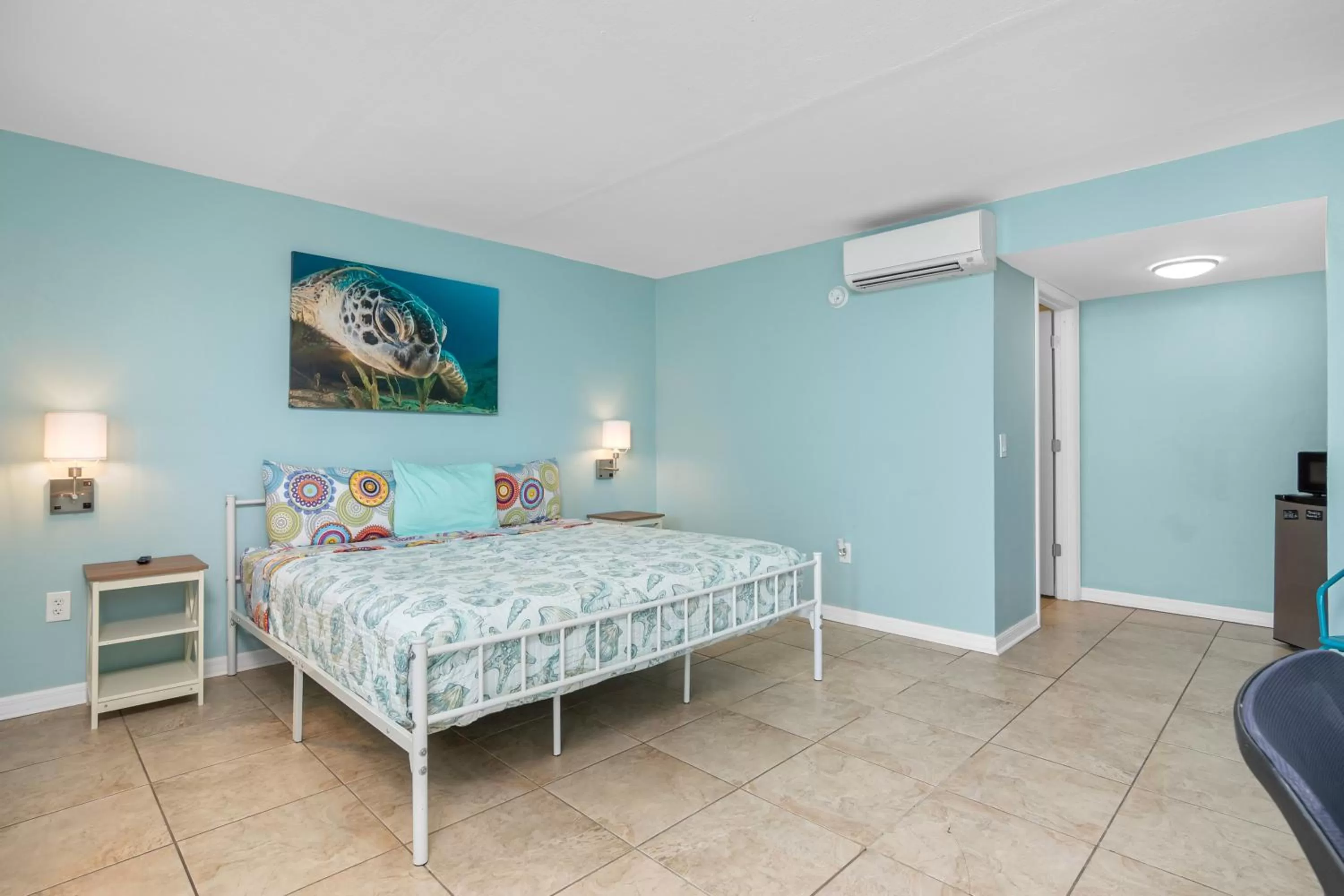 Bed in Latitude 26 Waterfront Resort and Marina