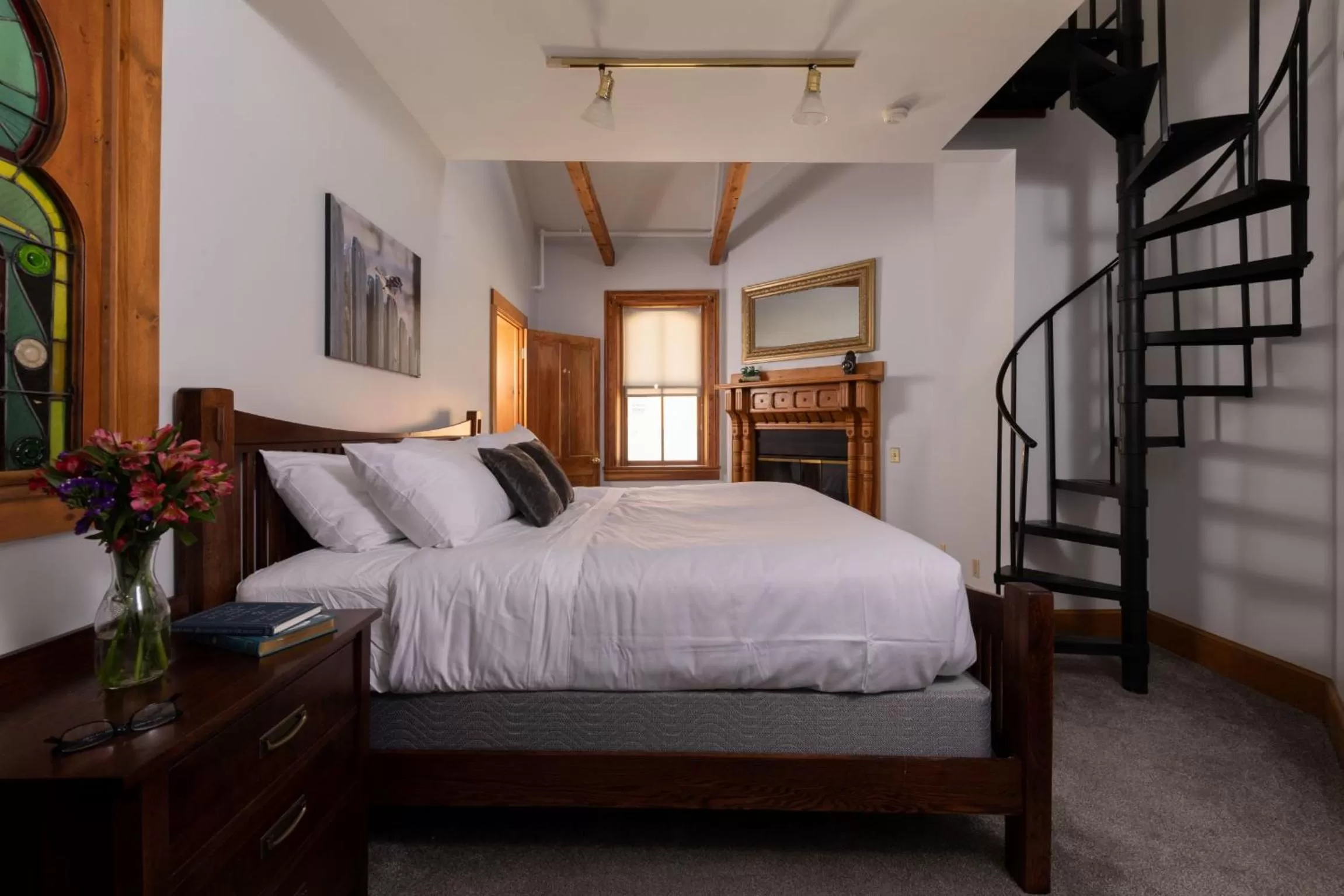 Bed in Riverboat Suites