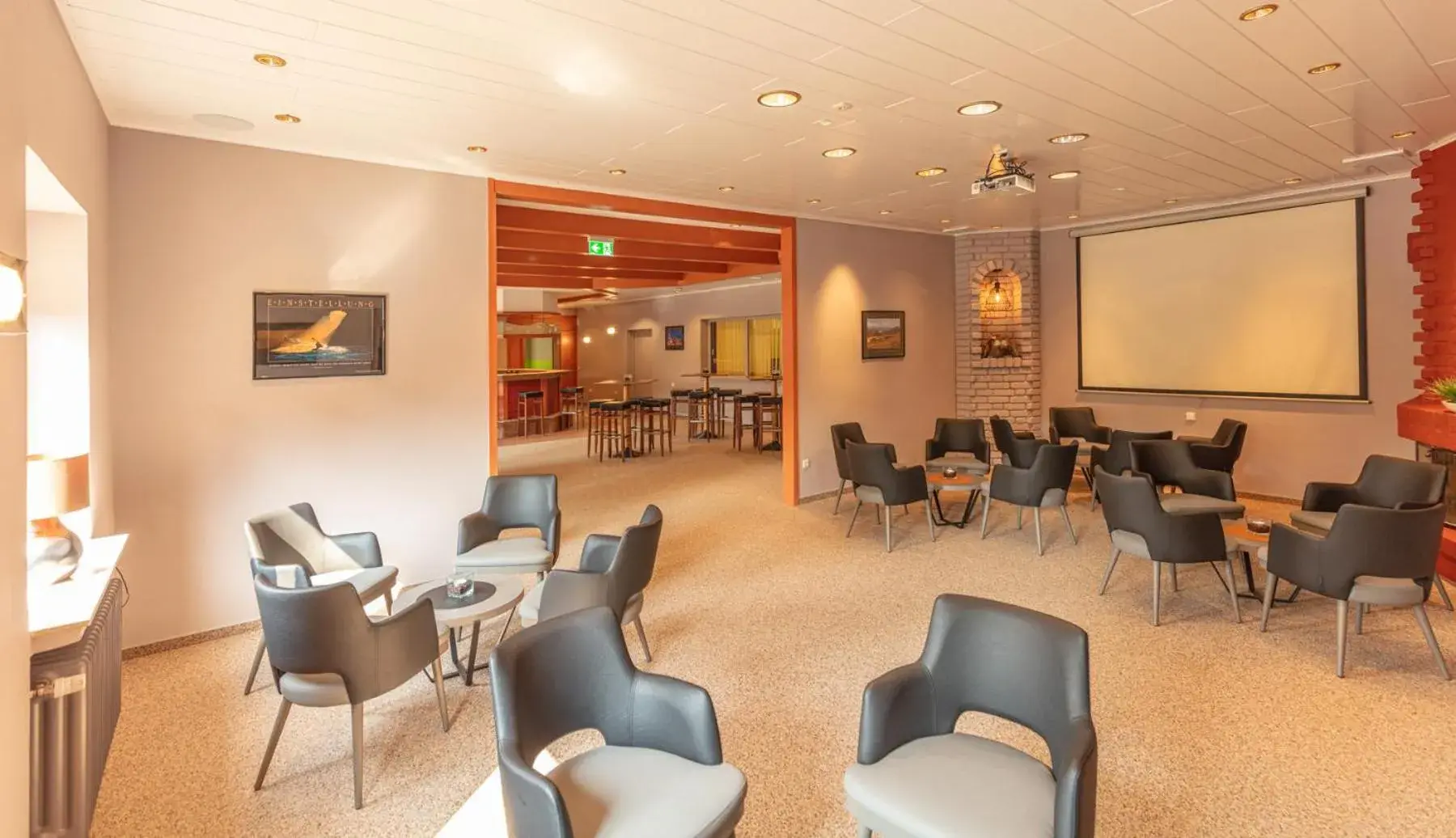 Communal lounge/ TV room in Sport- und Tagungshotel De Poort
