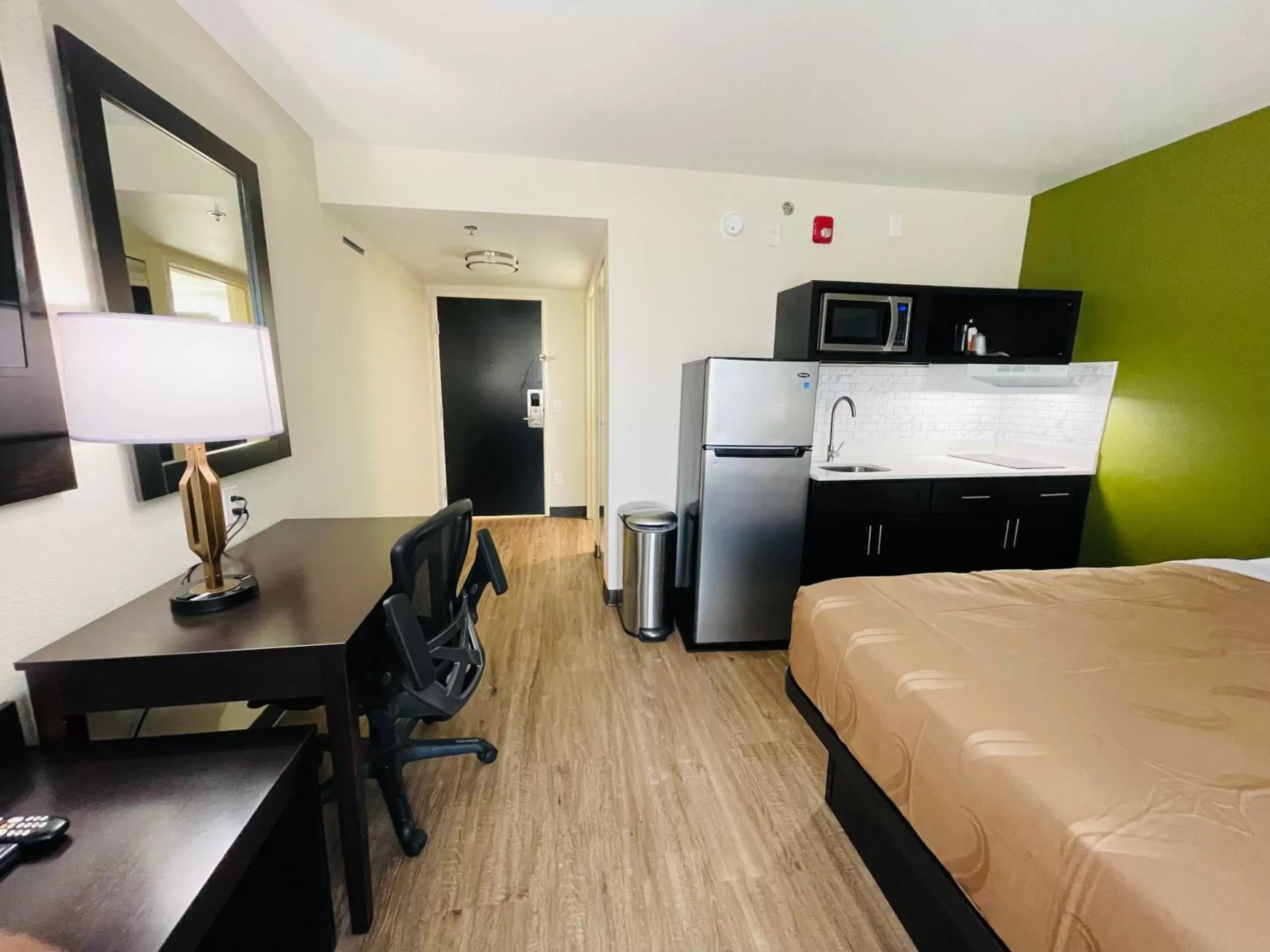 Photo of the whole room, TV/Entertainment Center in Quality Inn & Suites Lake Charles