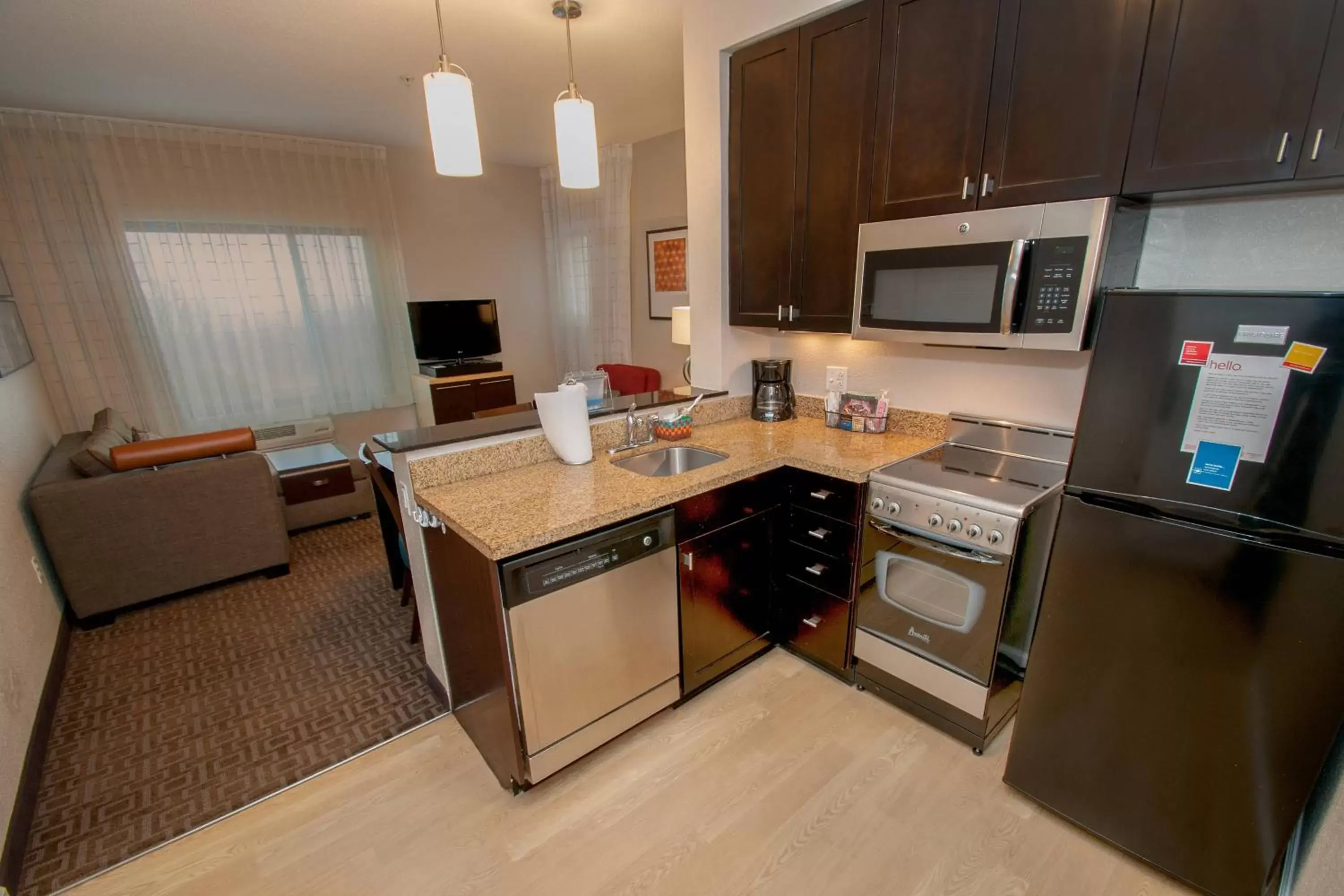 Living room, Kitchen/Kitchenette in TownePlace Suites by Marriott Scranton Wilkes-Barre