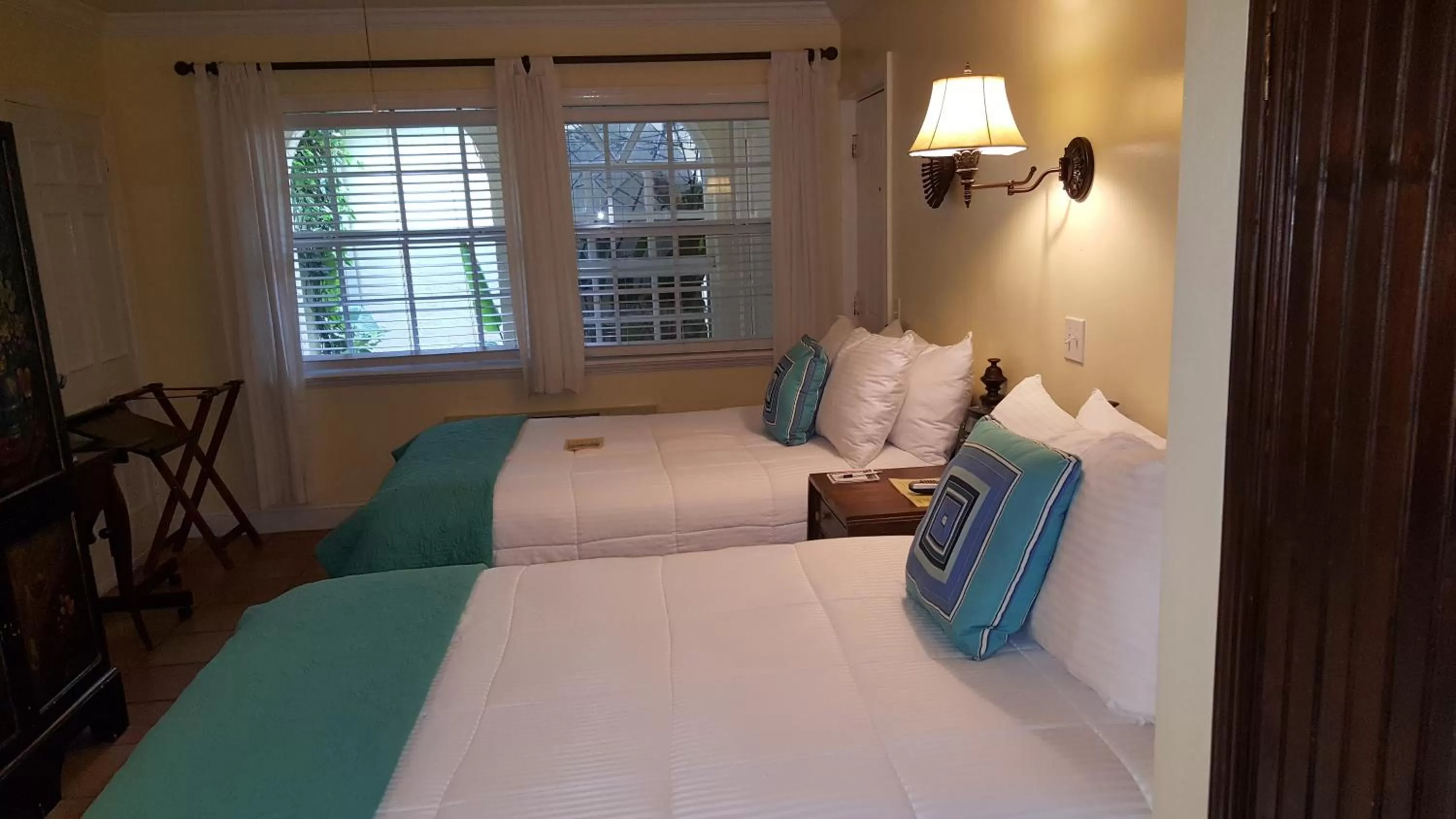 Bedroom, Bed in The Caribbean Court Boutique Hotel