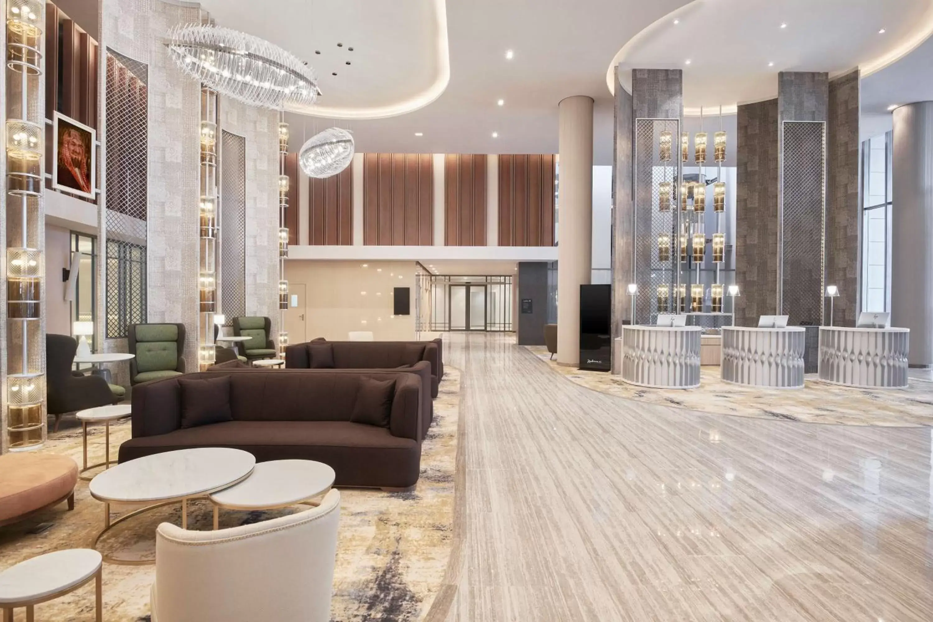 Lobby or reception, Lounge/Bar in Radisson Blu Hotel Riyadh Convention and Exhibition Center